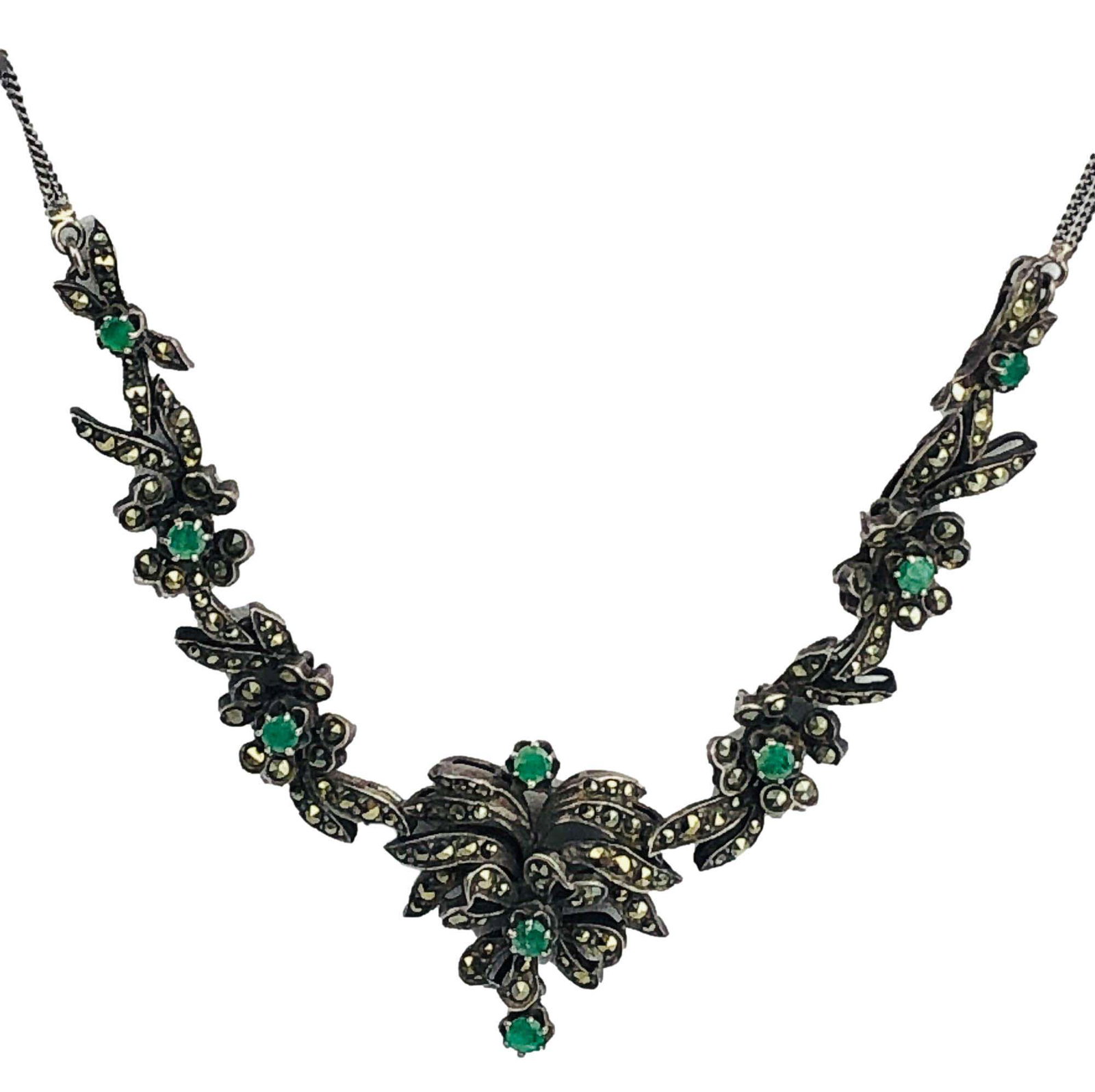 Victorian Green Emerald Marcasite Silver Necklace: Antique Victorian Revival 1940's era handcrafted jewelry with a strong Art Nouveau influenced design. Graced with green emeralds and sparkling marcasite. Simplistic lobster clasp closure. Original wea