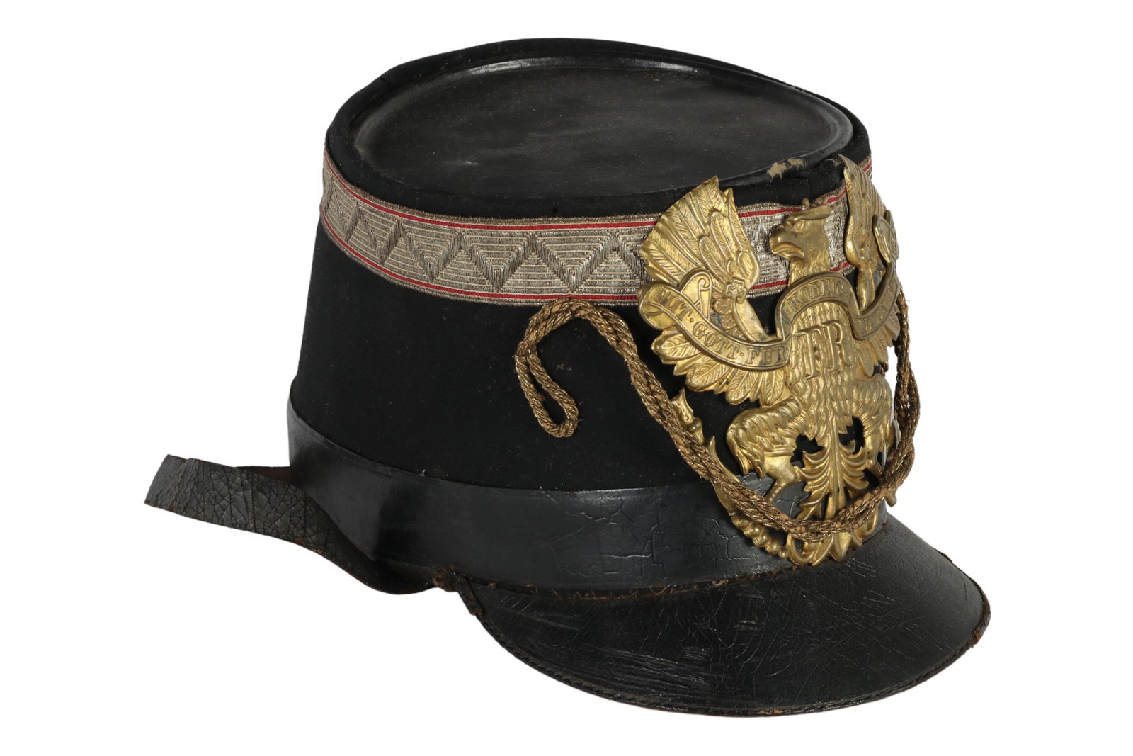 WWI Prussian German Military Officer Shako Cap Hat: A late 19th Century or early 20th Century pre World War I Prussian army officers shako dress hat cover. Felt body with lacquered black leather, with encircling gilded braid fabric band to top and gold