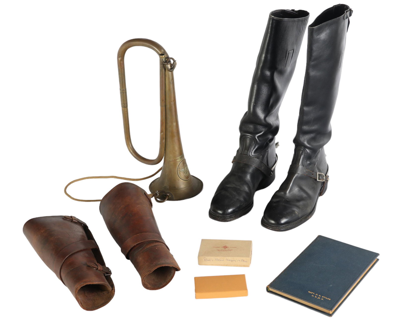 WWI USMC Leather Boots Leggings Bugle & Medal LOT: A collection of First World War militaria artifacts. Includes: one (1) pair of black leather boots with metal spurs (men's approximate size 9; no apparent signature); one (1) pair of brown leather leg