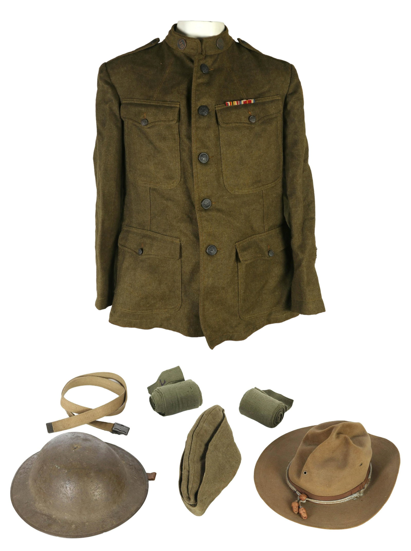 World War I AEF American U.S. Army Soldier Uniform: An original First World War United States Army Yankee Doughboy uniform and head covers, issued to a member of the American Expeditionary Forces (1917-1920). Includes: one (1) wool blouse coat, having 