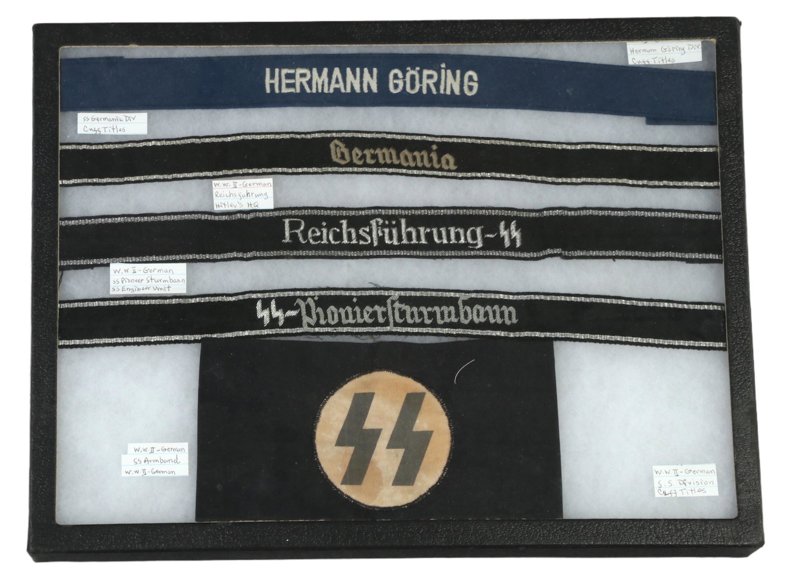 WWII Third Reich Waffen SS Division Cuff Bands LOT: An estate collection with five (5) Second World War German Waffen SS and Luftwaffe cuff title bands, accompanied by an SS armband. Includes: one (1) uniform cuff title band for the 1st Fallschirm Panz