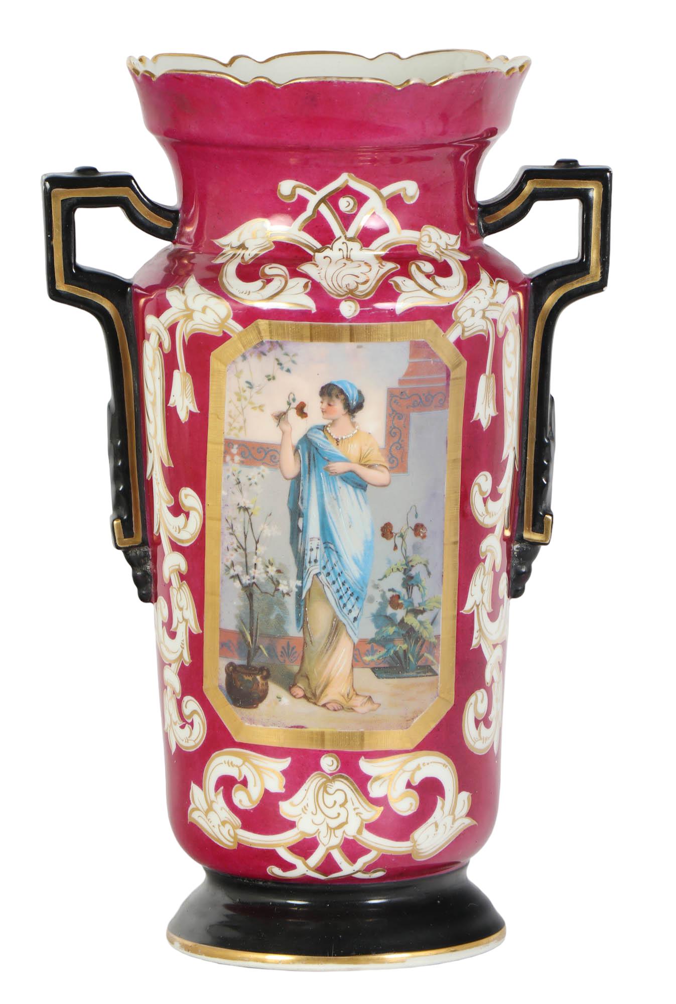 Antique French Old Paris Flower Lady Amphora Vase: 19th century French porcelain vase. In the Limoges style, vase features a black and gold painted handles, with a maroon ground and a central portrait, depicting an elegant woman, smelling a flower. A 