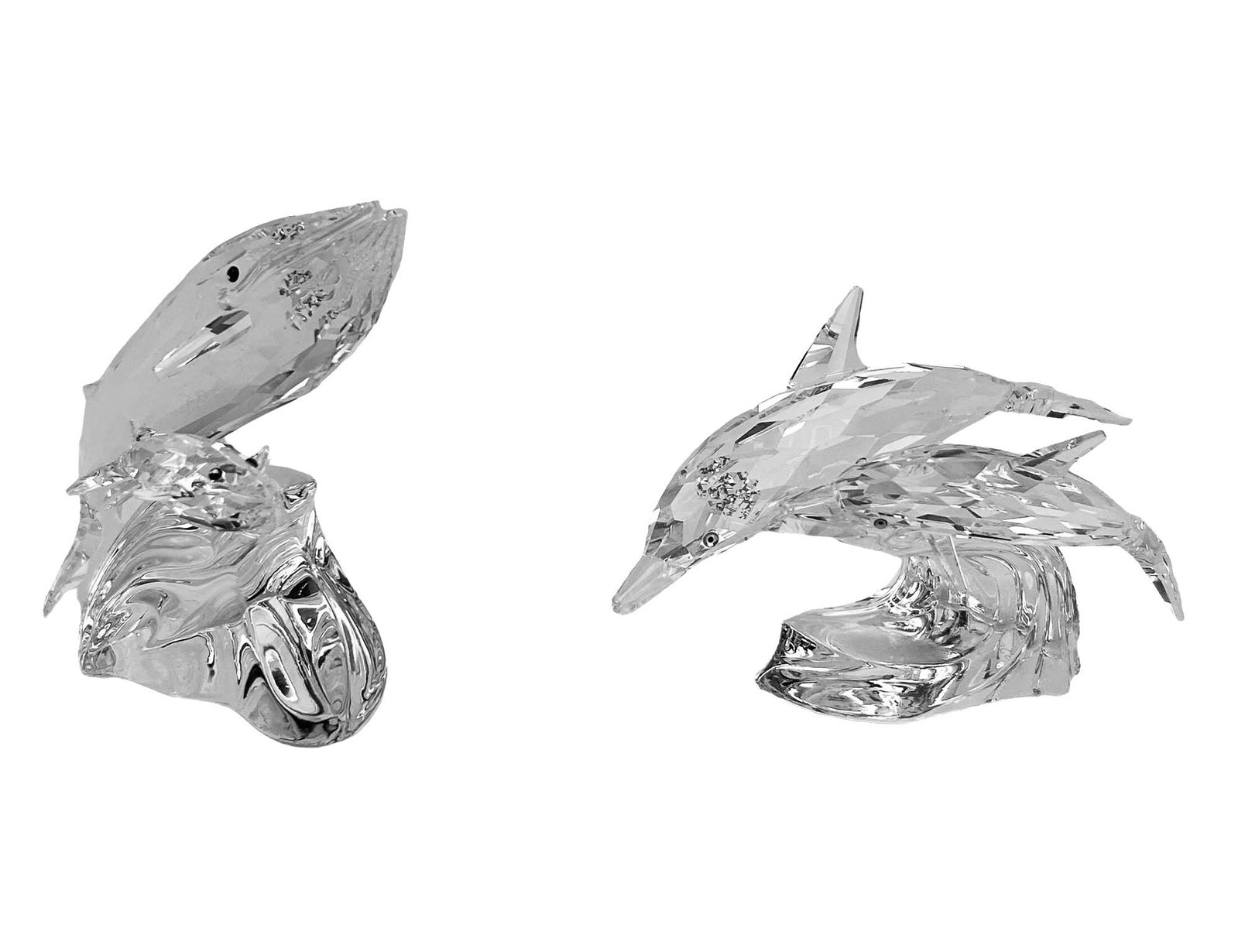Swarovski Crystal Whale & Dolphin Figurine 2pc LOT: Two Swarovski Austrian crystal figurines. Includes ~ 1 x Swarovski 1990 annual edition Dolphins "Lead Me". Production years : 1990 - 1990. 1 x Swarovski 1992 annual edition Whales "Care for Me". Produ