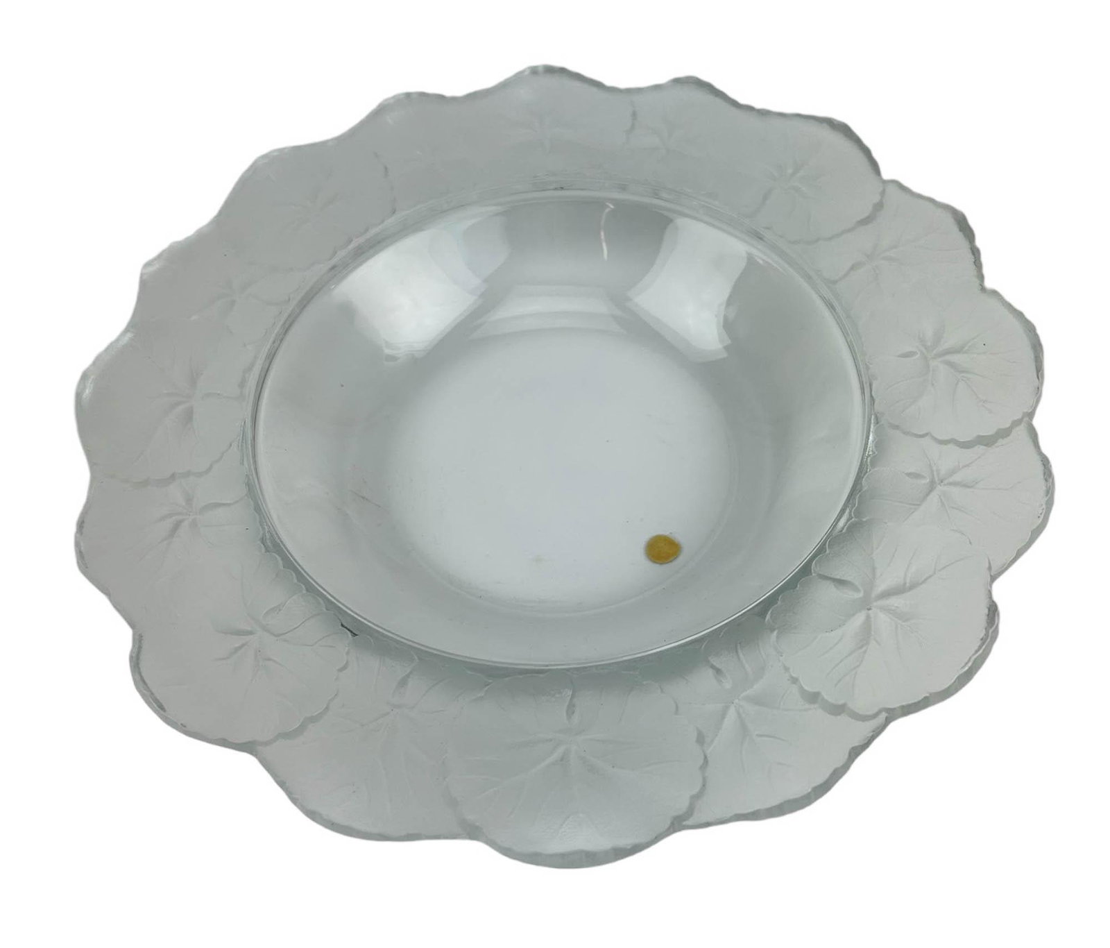 Lalique French Crystal Honfleur Leaf Relief Bowl: A vintage Lalique Centerpiece bowl. Features the Honfleur design, depicting and organic leaf motif of overlapping Nasturtium leaves. Etched signed LALIQUE FRANCE at bottom rim. Dimensions: 2 X 11 X 11