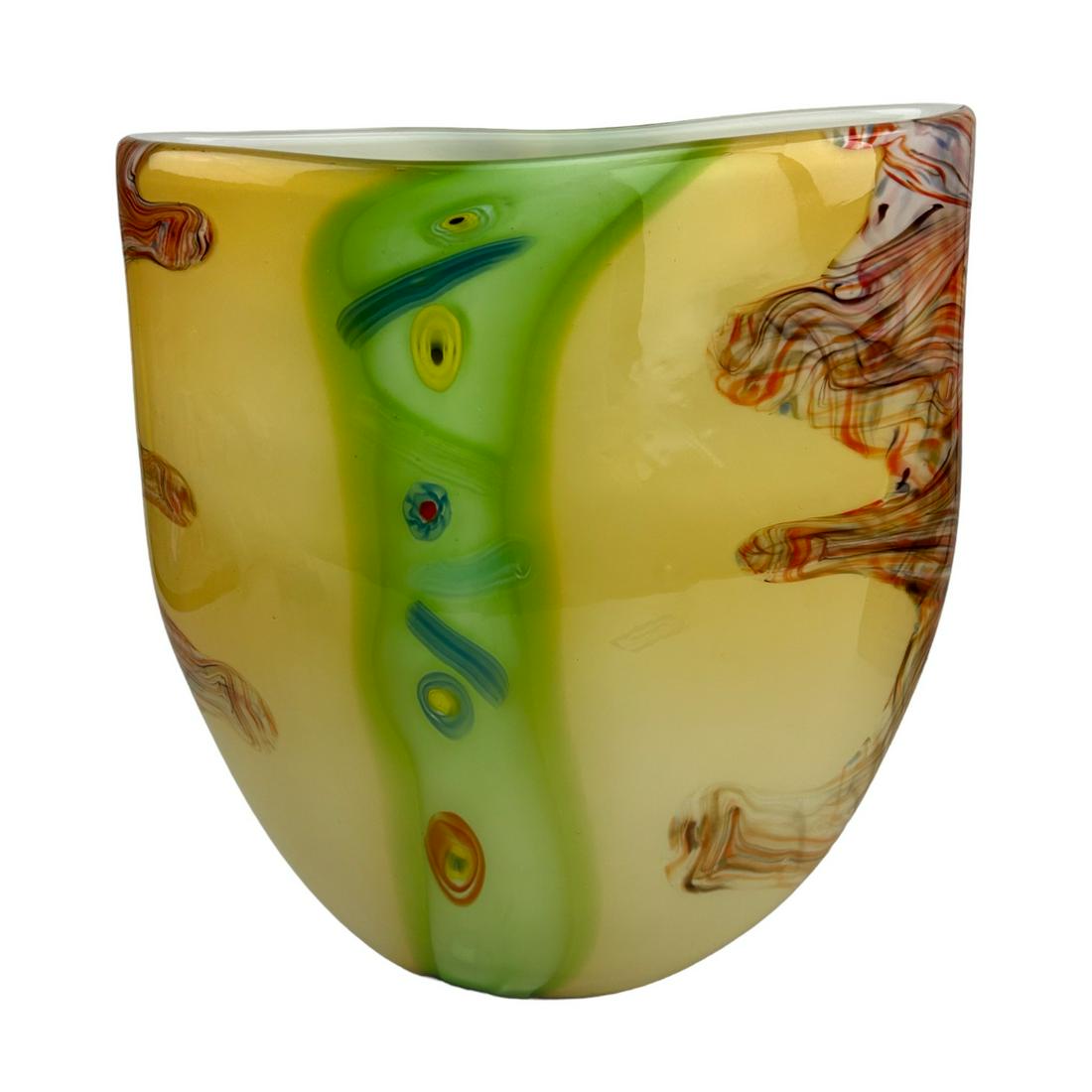 Murano Millefiori Swirl Italian Studio Glass Vase: 20th century Italy Murano Italian art glass studio hand blown shelf mantle vase. Unique pillow style form with oval opening atop. Graced with internally case millefiori cane accents, green vertical ba
