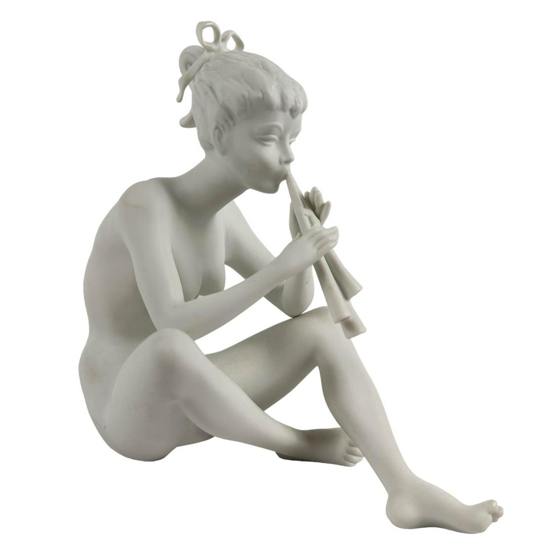 Kaiser Mid Century Modern Nude Pan Flute Figurine: German studio hand crafted porcelain curio cabinet display figurine modeled by K Langer. Made in Germany by Kaiser. Depicts a slender young nude in seated pose playing a pan flute. Matte finish. Signe