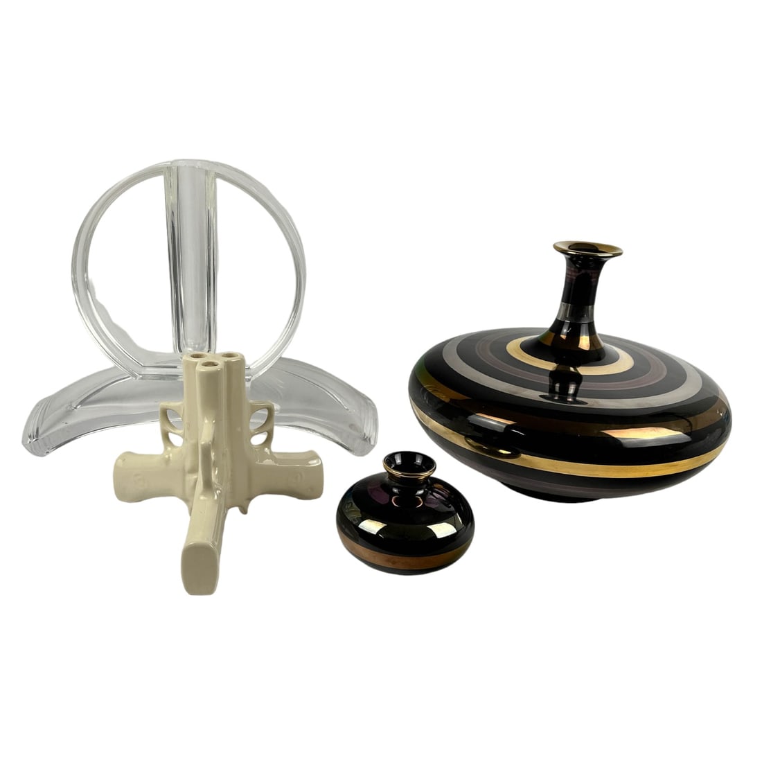 Large MCM Lucite & Glazed Ceramic Vase ESTATE LOT: A collection of four vases, and a tray. Includes (1) 10" x 14" Yapacunchi black and purple glazed porcelain bottle nose vase,featuring metallic stripe designs, and (1) matching smaller vase measuring