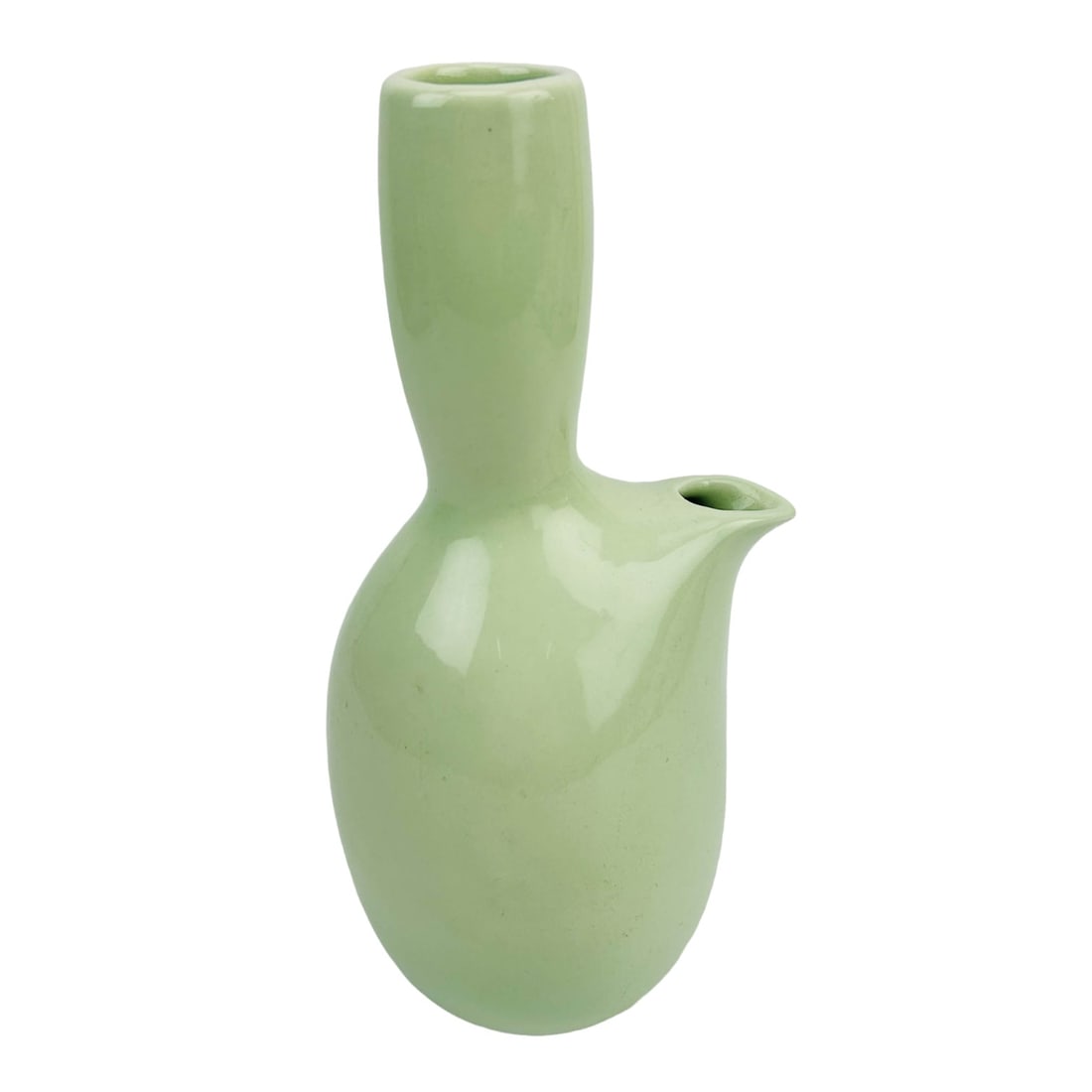 Russel Wright Steubenville Barware Wine Carafe: Mid century modern studio handcrafted American pottery by Russel Wright ( American, 1904 - 1976 ) for Iroquois China. Modeled with his trademark curvy silhouette, rounded corners and an earthy pastel