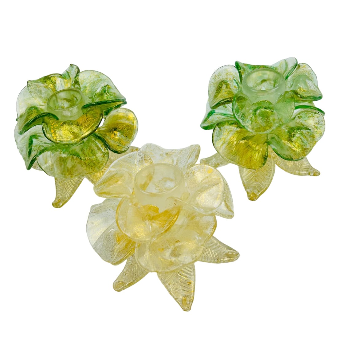Murano Venetian Art Glass Gold Dust Candleholders: 20th century Italy studio hand blown art glass shelf mantle display candleholders. All modeled in the shape of a blooming rose mounted atop a 5 leaf glass base. All graced with internally cased gold d