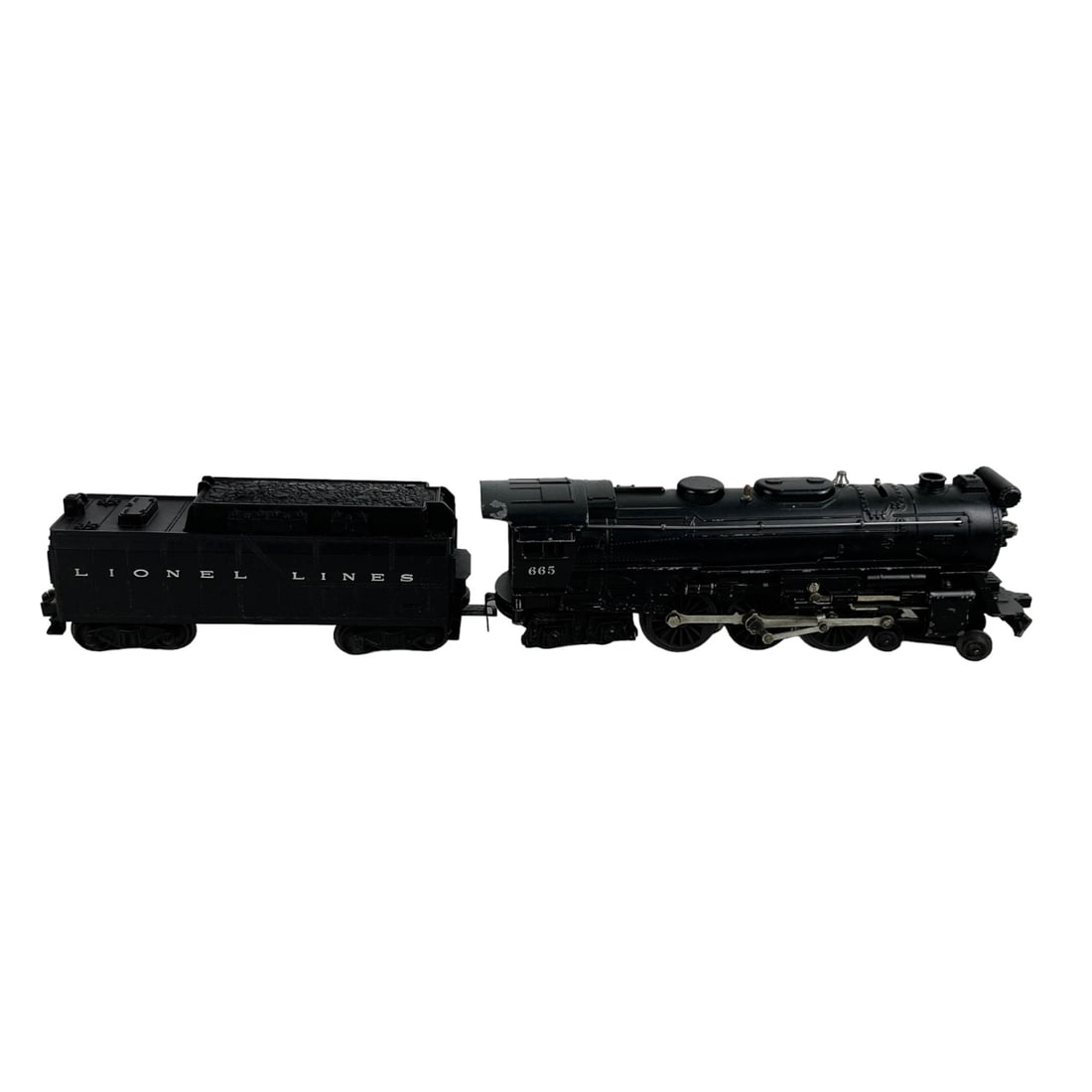 Lionel Steam Locomotive Train #665 w/ Coal Tender: Estate 2 piece Lionel railway railroad toy collectible memorabilia. Includes ~ 1 x Steam Locomotive #665. 1 x Coal Tender. Each accompanied in a box. Measure from 8" - 10 1/4" Signed ~ stamped / marke