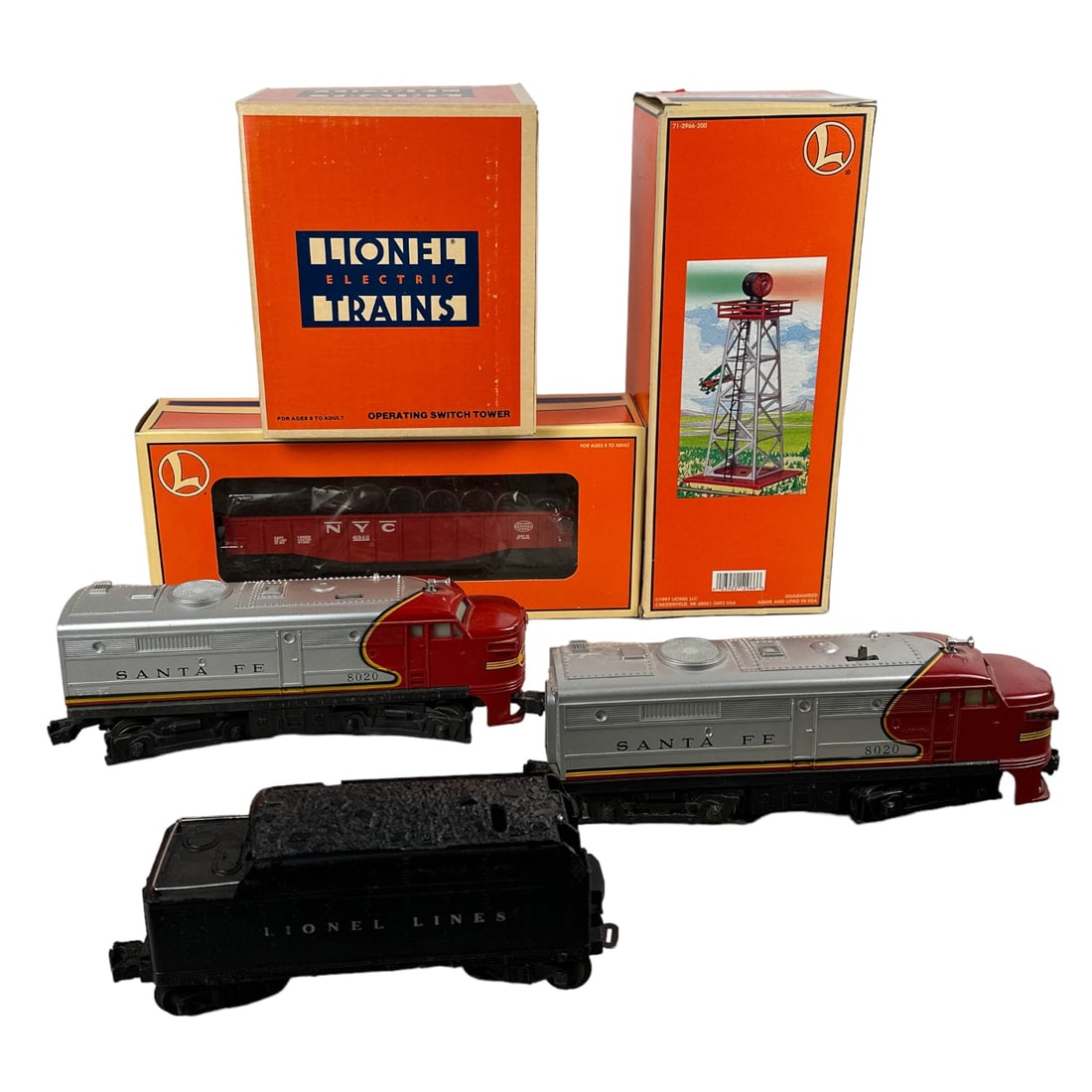 Lionel Santa Fe Diesel Engine Aircraft Beacon LOT: Estate collection lot of a total of 6 x Lionel train railway railroad collectible memorabilia. Includes ~ 2 x Santa Fe #8020 Diesel Engines. 1 x Rotary Aircraft Beacon #6-12966. 1 x Operating Switch T