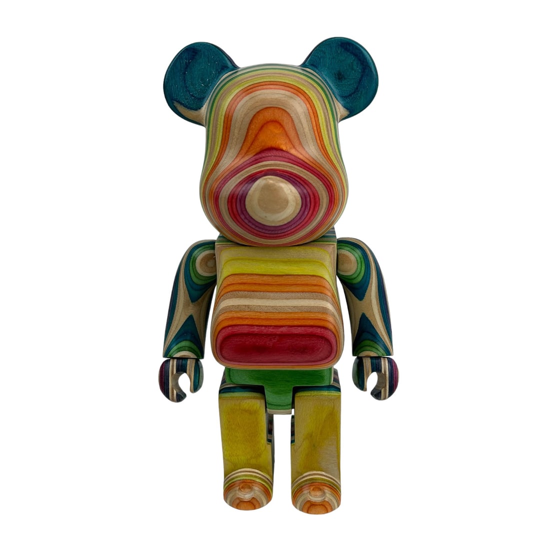 Rainbow Bear Replica Wood Sculpture after Haroshi: A wooden collectible Bearbrick replica toy bear action figure after Haroshi (Japanese, 21st Century). The statute appears to be constructed from multi colored skateboard decks. Articulated elements in