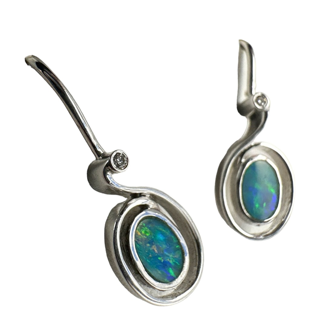 Sterling Silver Pair of Australian Opal Earrings: Hand crafted articles of women's jewelry designed for pierced ears. Each modeled with a doublet opal ( Australia's national gemstone ) mounted on sterling silver 925. Signed stamped 925 with hallmark.