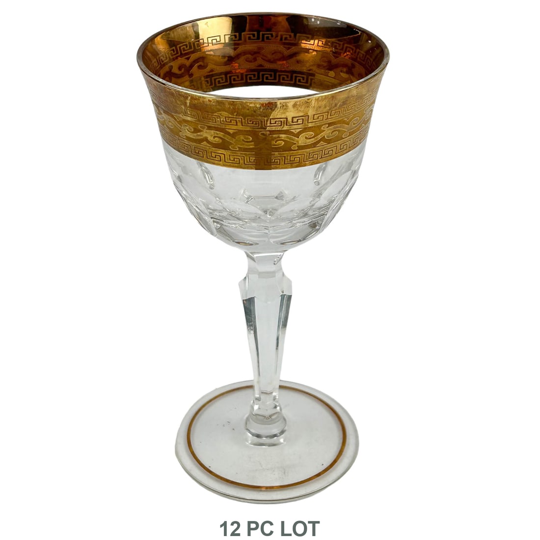 12 Art Deco Gold Band Greek Key Wine Glass Goblets: Estate lot of a total of 12 20th century crystal art glass bar barware glasses. The gold band around the mouth of each with a Greek Key and scroll pattern with a convex cut panel design around the bod