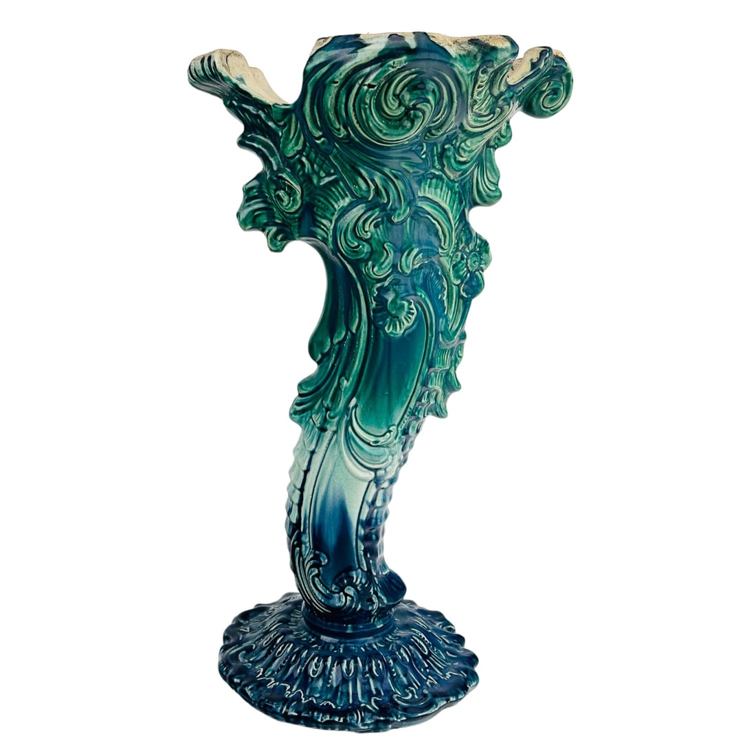 Antique English Majolica Stylized Dolphin Pedestal: English early 20th century planter pedestal base. Modeled as a styled dolphin form with partial segmented tail and scroll shapes. Glazed finish. Signed ~ stamped England on the inside in raised molded