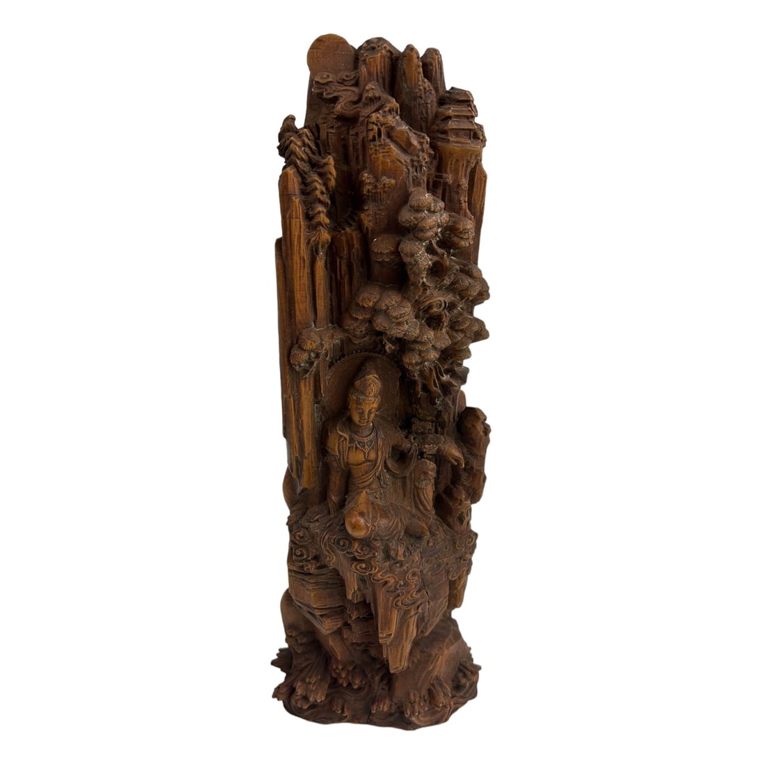 Chinese Buddha Kwan Yin Deity God Wood Sculpture: Chinese 20th century carved wood sculpture depicting the revered Buddha in seated pose, resting under overhanging foliage, against a mountainous ground. Well detailed in manner. No apparent markings. 