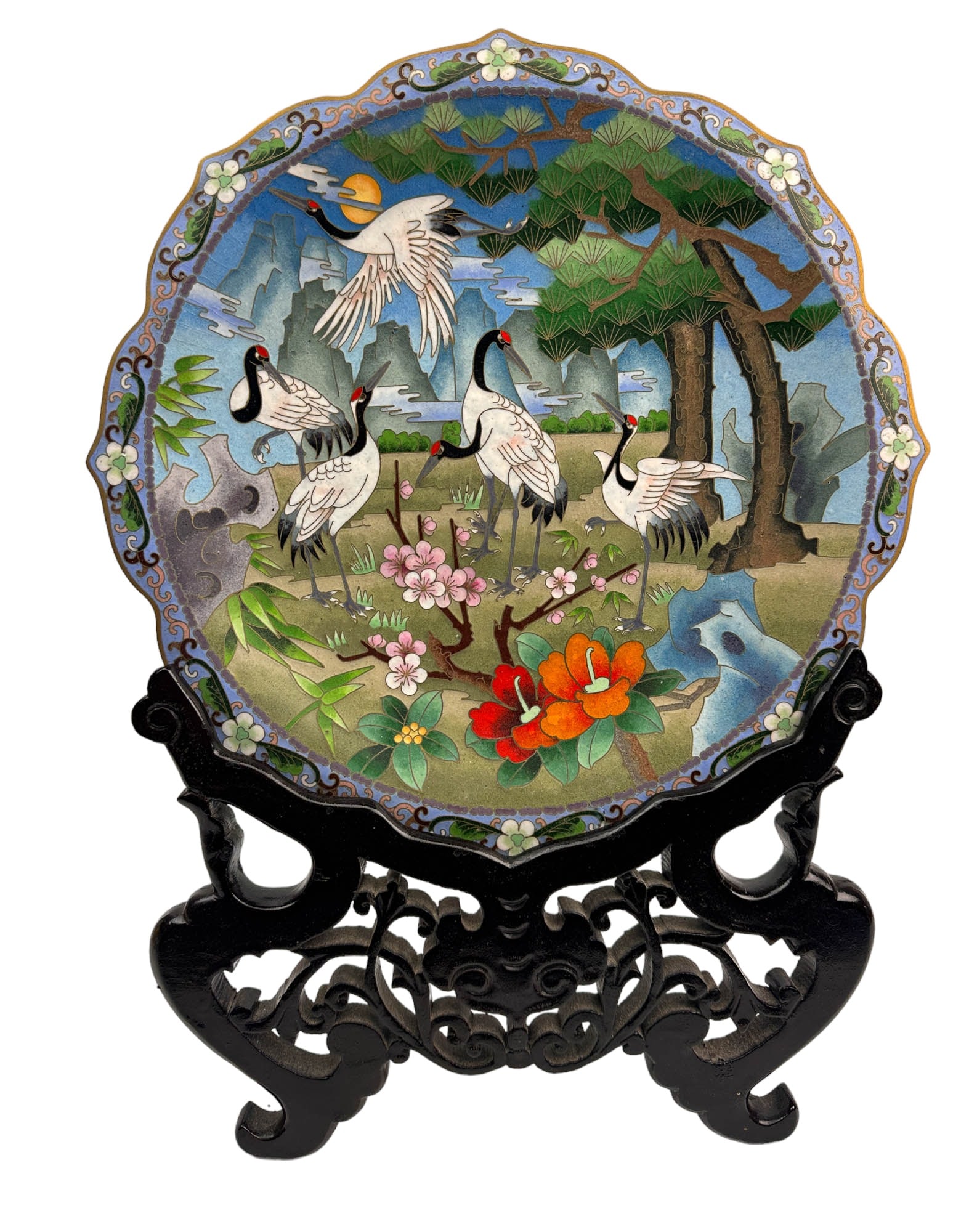 Jingfa Cloisonne Enamel Stork Crane Bird Plate 12": 20th century Japan Japanese cloisonne enamel charger plate. Decorated with a nature inspired wildlife scene depicting Red Crown Cranes amidst foliage and tall trees and flowering plants with mountains
