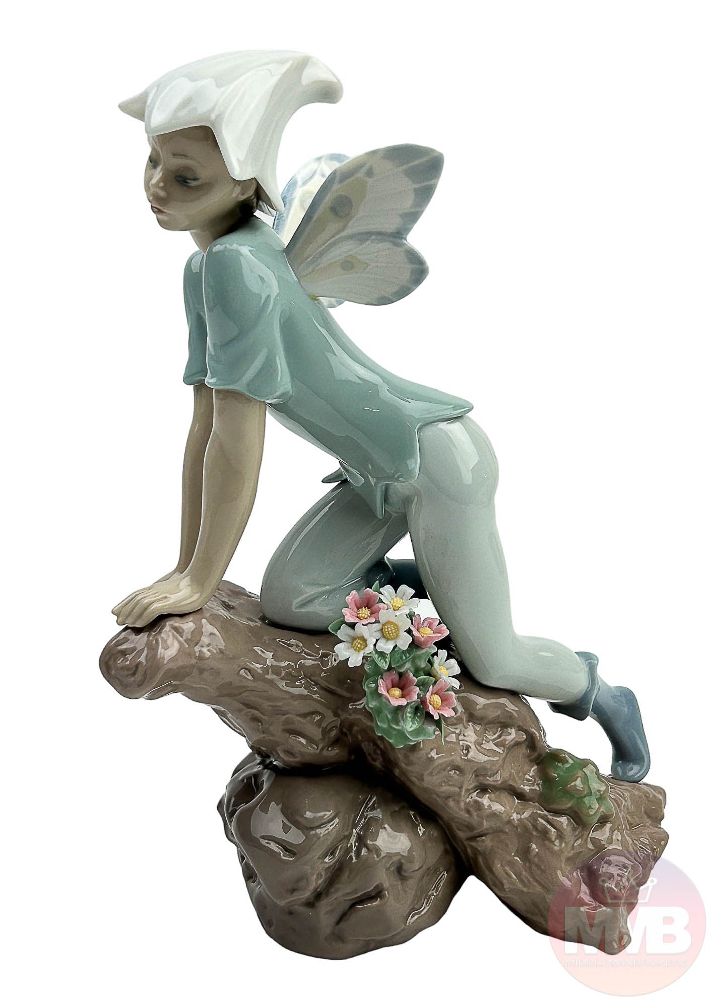 Lladro Prince of the Elves 7690 Porcelain Figurine: Lladro Spain hand painted porcelain curio cabinet display figurine. tilted : Prince of the Elves. Model number : 7690. Sculptor : Joan Coderch. Production Years : 2001 - 2003. Finish : Glazed. Signed 