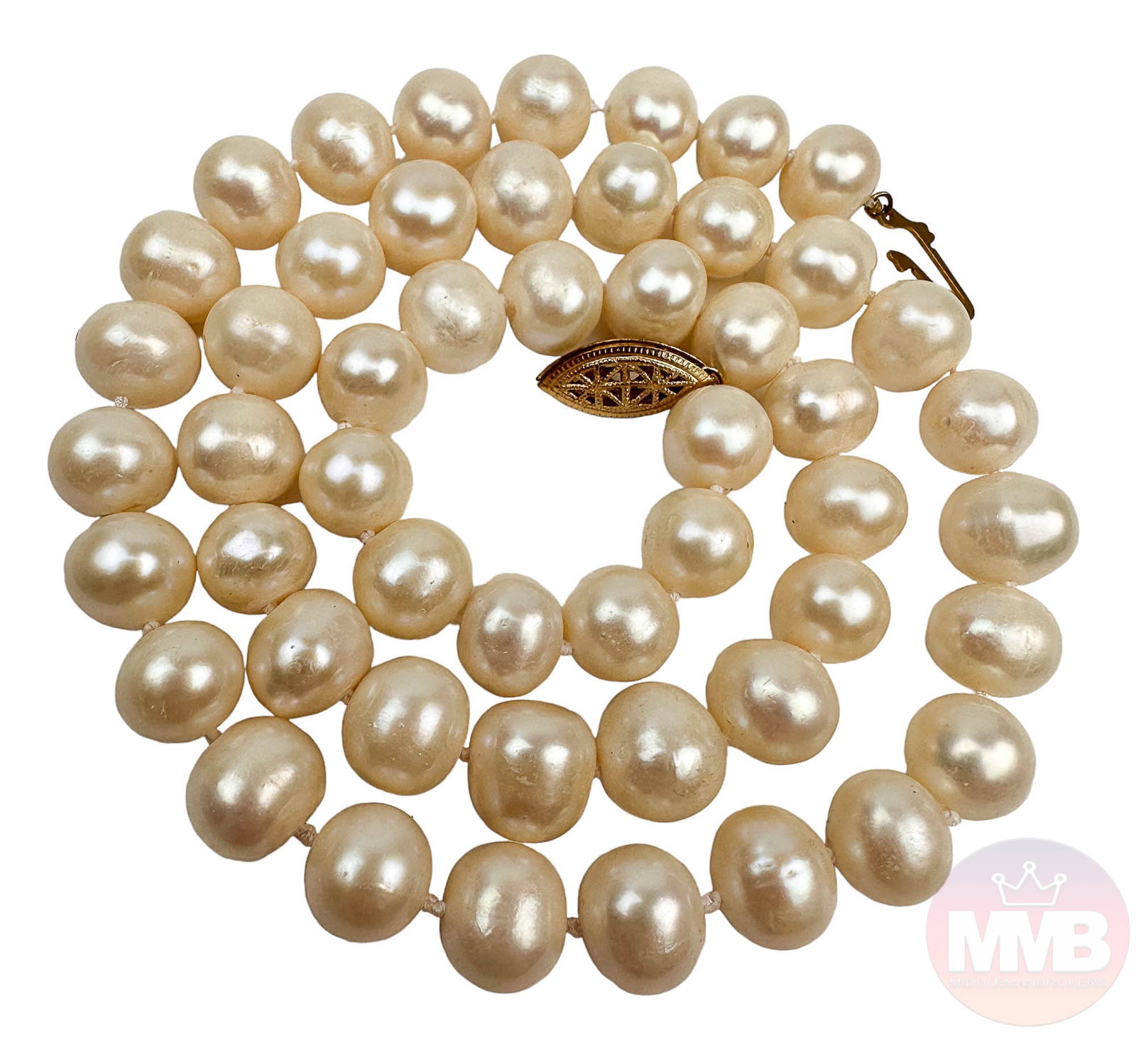 Round Freshwater Cultured Pearl Necklace 21 1/4": Hand knotted single strung ladies pearl necklace. Comprised of a total of 51 pearls with nice luster. Finished with a gold filled fish hook clasp closure. Measures 21 1/4". Pearls measure 8mm - 11mm. 