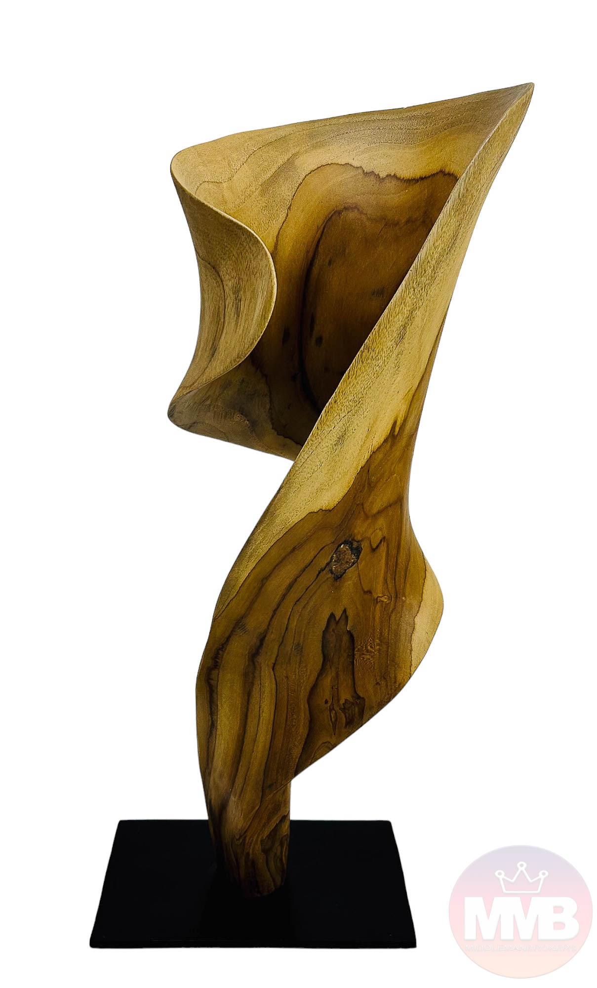 Arteriors Hissa Hand Carved Teak Wooden Sculpture: Indonesian 20th century hand carved wood sculpture from Arteriors. The natural teak wood is carved into a twisted form and polished to a smooth mirror finish. Mounted atop a black metallic rectangular