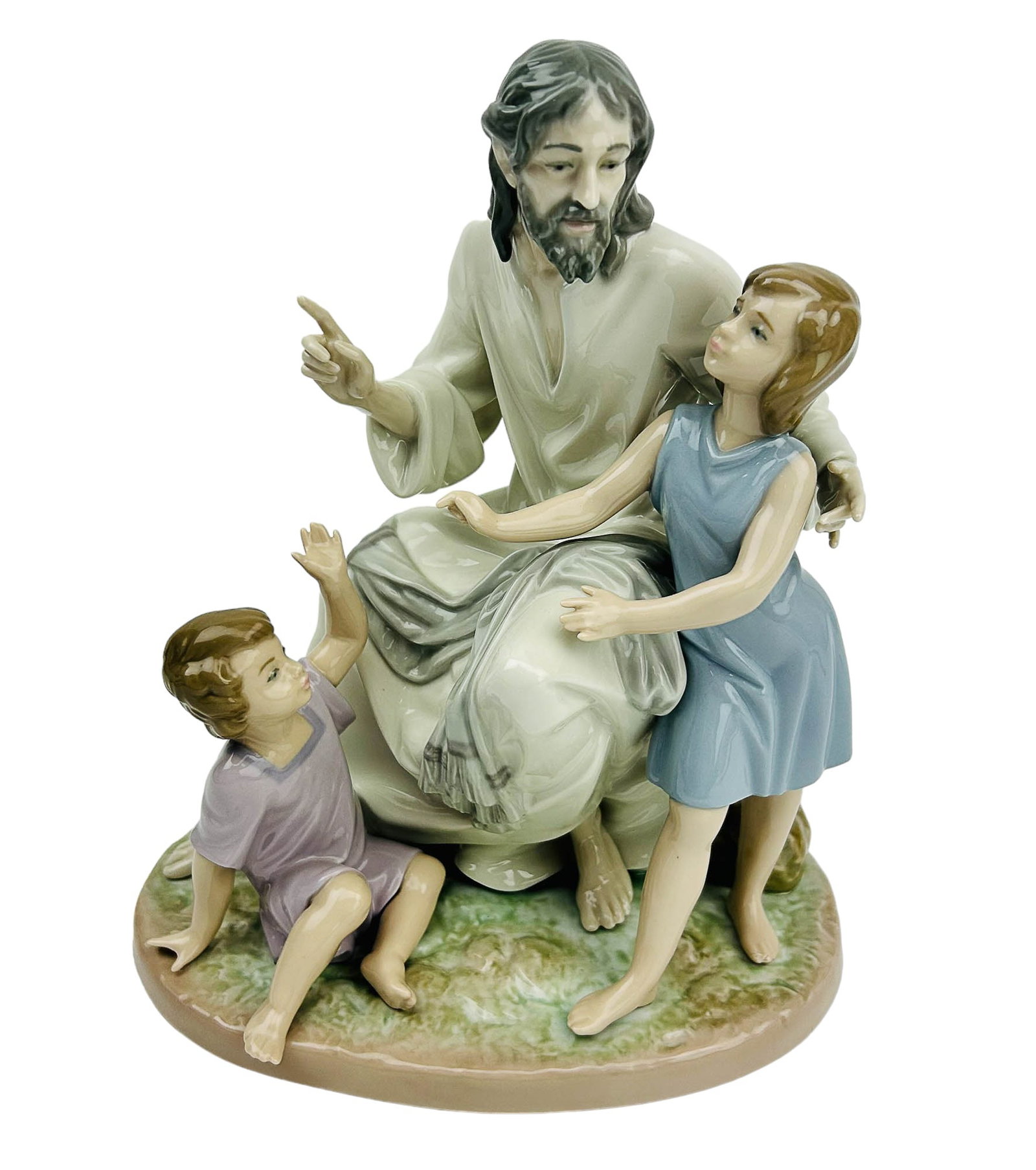 Lladro The Great Teacher #5961 Porcelain Figurine: tilted : The Great Teacher. Model number : 5961. Sculptor / Designer : Salvador Furio. Production Years : 1993 - 1996. Finish : Glazed. Features Jesus Christ preaching the word of God to young childre