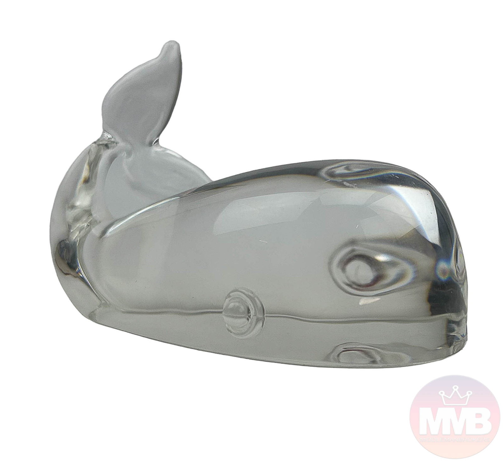 Steuben Crystal Whale Paperweight Glass Sculpture: Mid century American studio hand blown clear crystal nature art glass figurine. Designed by Lloyd Atkins in 1956. Model number 8075. Features this large marine mammal with a stylized whimsical appeara