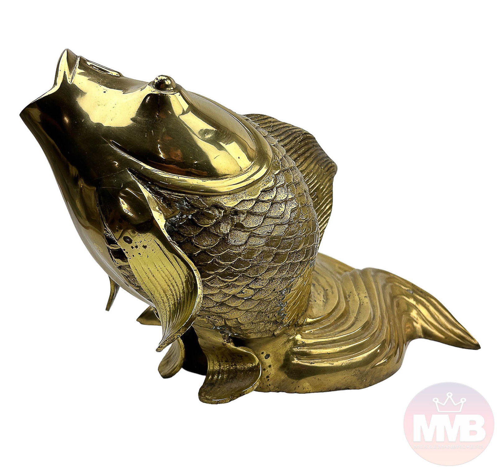 Hollywood Regency Brass Fantail Goldfish Sculpture: Features a rotund and plump globular eyed fan tailed goldfish with open mouth, looking upwards. Nice contrast of the raised relief scales on the body, the fluted ribbed patterns on the wavy tail and t