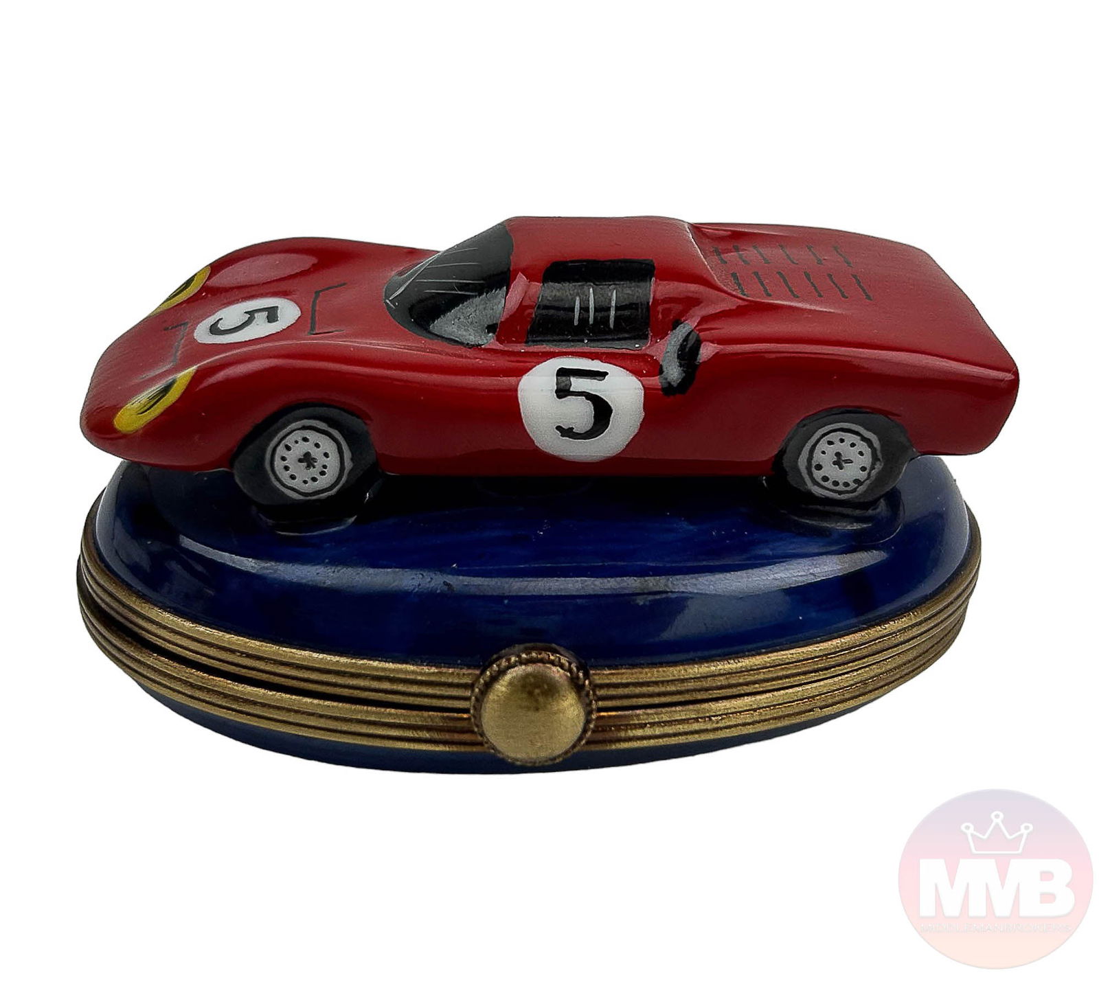 Limoges Porcelain Grand Prix Race Car Trinket Box: A French 20th Century hand painted and hand crafted porcelain jewelry heirloom box modeled as a red colored race car with number 5. Gilt brass mounted hardware with a disc clasp closure. Glazed finish