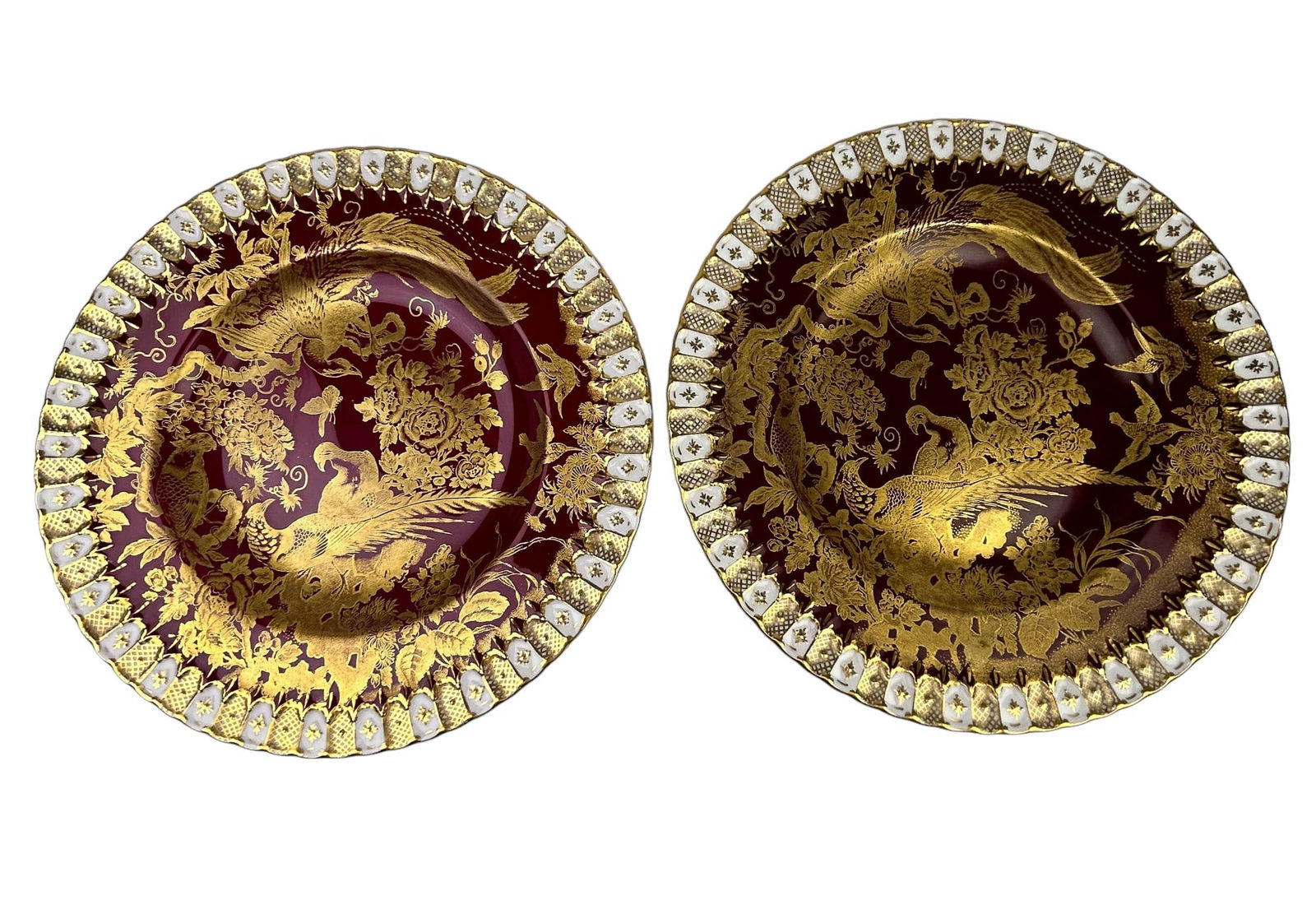 Royal Crown Derby Paradise Maroon Dinner Plate 2pc: Manufacturer : Royal Crown Derby. Country of origin : England. Pattern name : Paradise Maroon. Production years : 1965 - 1970. Material : Bone China. Design features exotic pheasant game birds, a parr