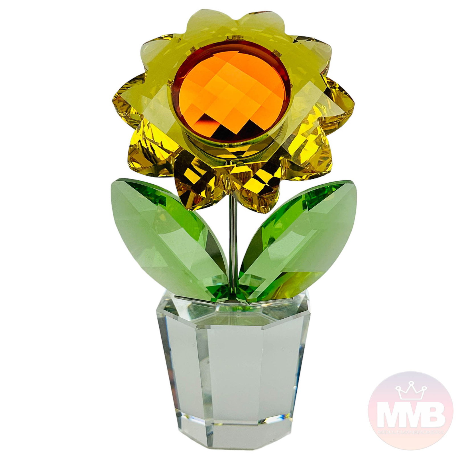 Swarovski Crystal Sunflower Large Glass Figurine: Manufacturer : Swarovski. Country of origin : Austria. Model number : 9400. Designer : Team. Production years : 2005 - 2010. Part of The Happy Flowers group themed series. Modeled with a red topaz cen