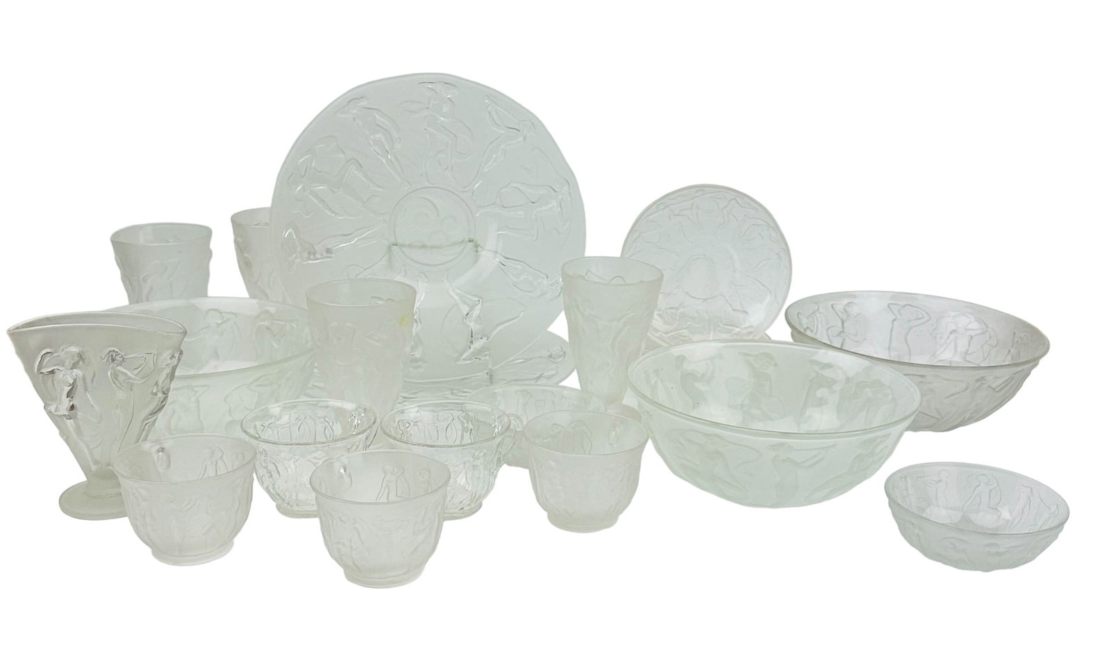 Consolidated Martele Clear Frosted Nude Glass 21pc: Manufacturer : Consolidated Glass Company. Country of origin : United States. Pattern : Martele Clear ( Frosted ). Production years : 1926 - 1941. Feature dancing nymphs in raised relief around the bo