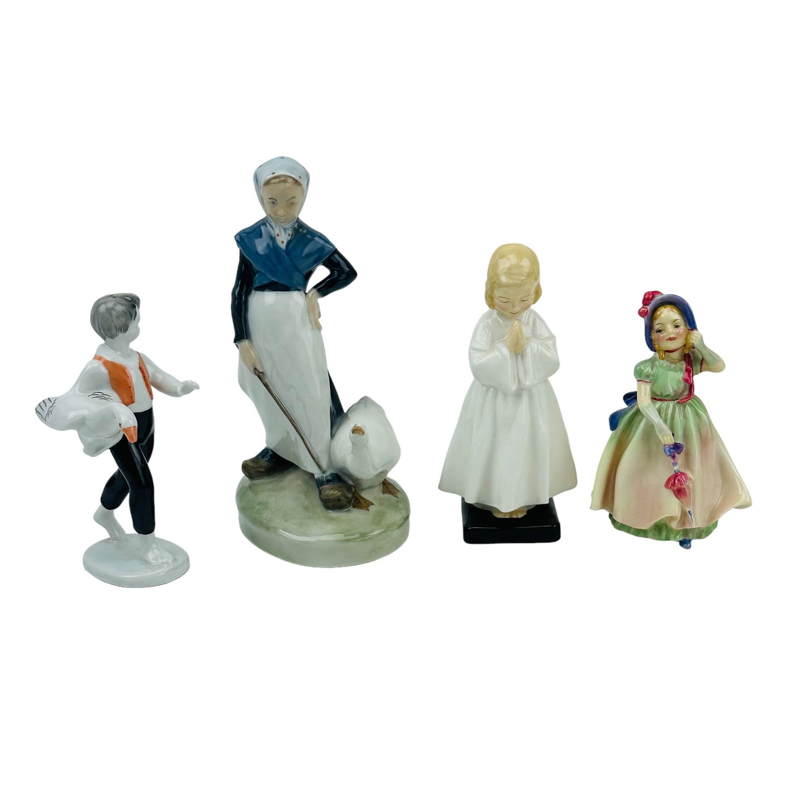 Royal Copenhagen Doulton Hollohaza Figurine 4p LOT: Estate collection lot of a total of four (5) Danish, English and Hungarian porcelain curio cabinet displays. Includes ~ One (1) Royal Copenhagen Denmark figurine - Goose Girl #528. Two (2) Royal Doult