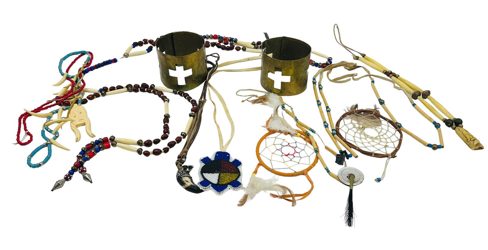 Native American Indian Tribal Primitive Jewelry: Estate collection lot of handcrafted dream catchers and necklaces of Native American Indian cultural art. Includes necklaces made with metal and glass beads, bone / horn hairpipe and leather accents.
