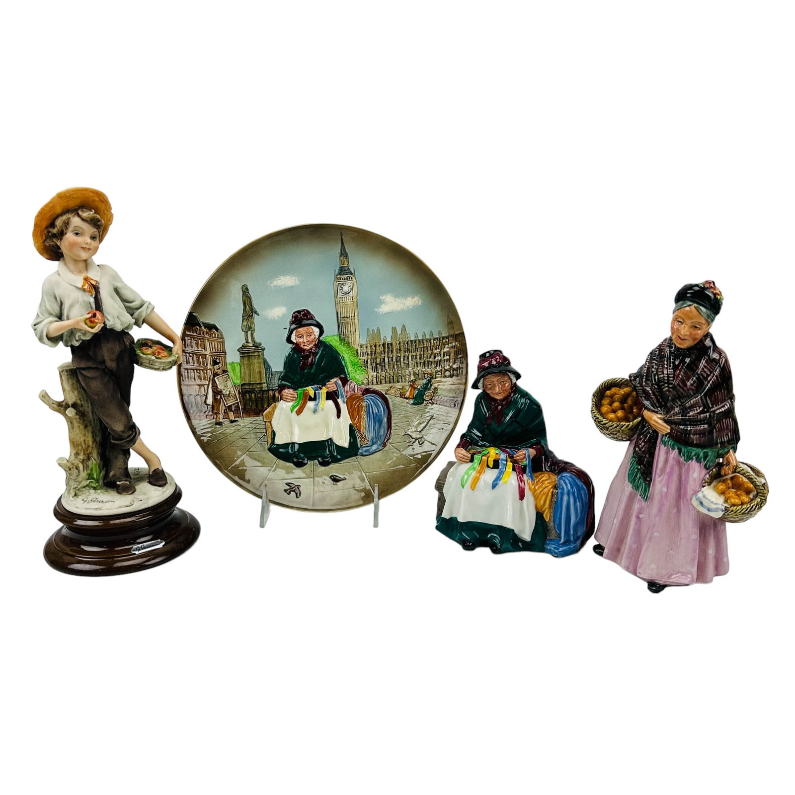Armani Boy Royal Doulton Plate Lady Figurine 4pc: Estate collection lot of a total of four curio cabinet displays. Includes ~ One (1) Giuseppe Armani, Florence Italy ~ Boy with Apples #130C. Two (2) Royal Doulton English bone china figurines ~ Silks 