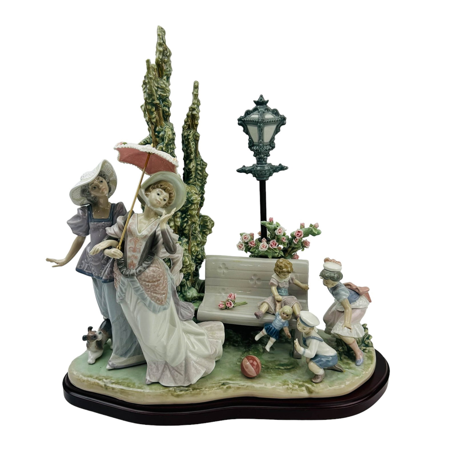 Lladro A Stroll in Park #1519 Porcelain Figurine: Manufacturer : Lladro. Country of origin : Spain. Name / Titled : A Stroll in the Park. Model number : 1519. Sculptor : Salvador Debon. Production years : 1987 - 1997. Finish : Glazed. Features a figu