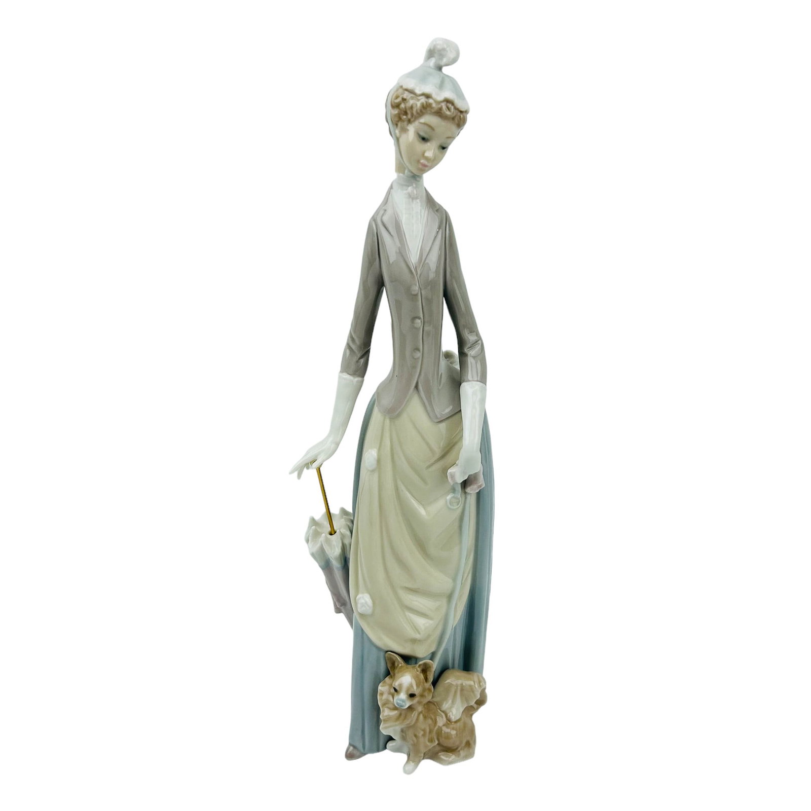 Lladro Spain Woman w/ Dog #4761 Porcelain Figurine: Manufacturer : Lladro. Country of origin : Spain. Name / Titled : Woman with Dog. Model number : 4761. Sculptor : Vincente Martinez. Production years : 1971 - 1993. Finish : Glazed. Features a young a