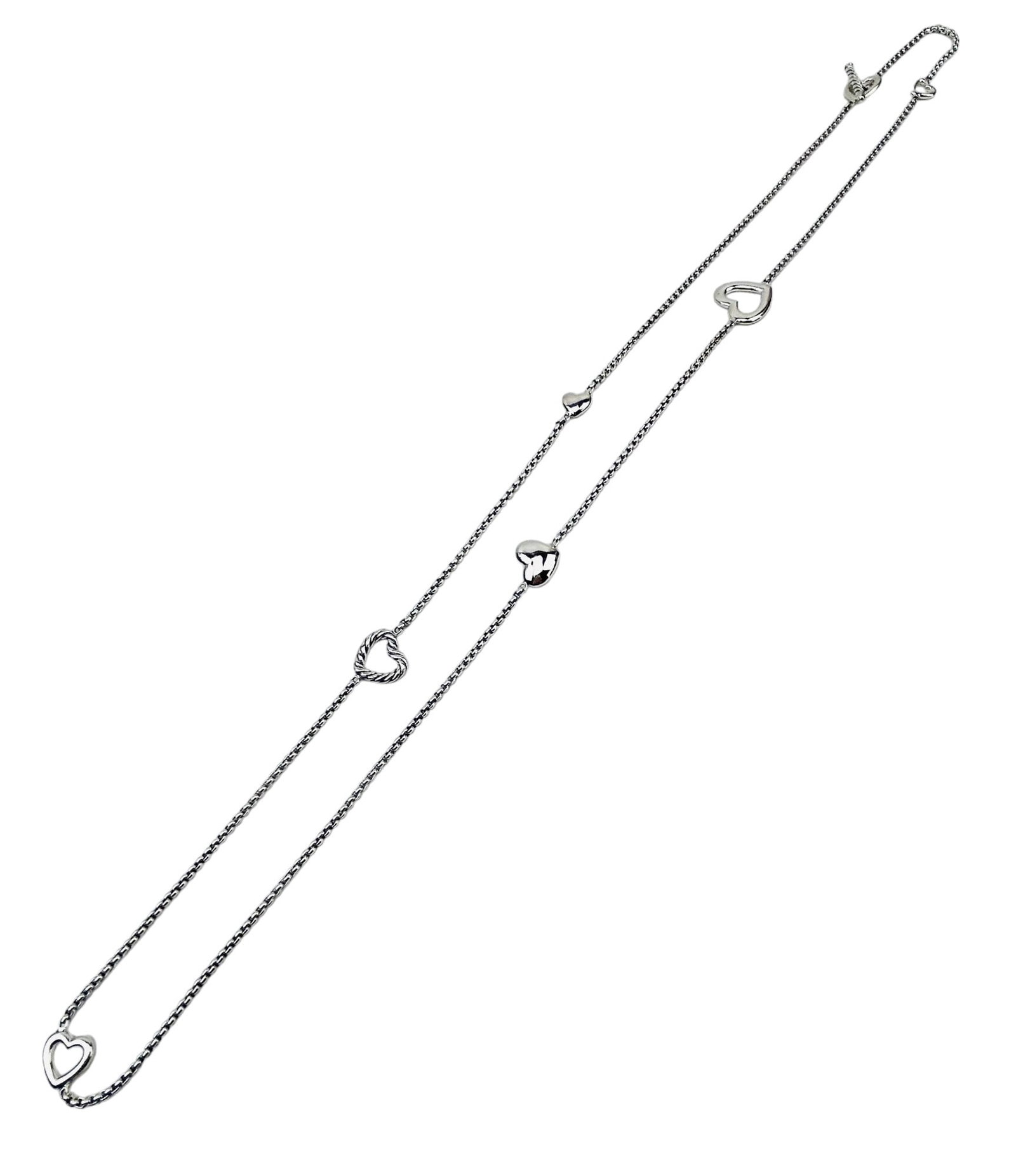 David Yurman Sterling Silver Lariat Heart Necklace: David Yurman ~ America's foremost luxury jewelry brand. Founded over 40 years ago by husband and wife team David and Sybil ~ a sculptor and painter. Recognized worldwide for innovative design and exqu