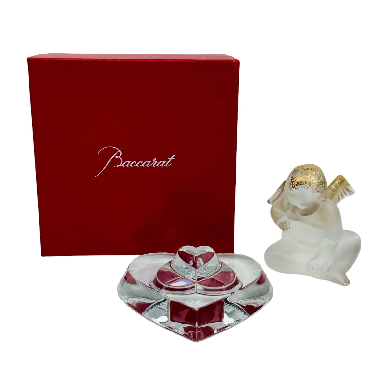 Lalique Cherub Figurine Baccarat Heart Paperweight: Estate collection lot of two (2) French crystal 20th century art glass collectible displays. Includes ~ One (1) Baccarat France Heart Desk Paperweight with box and card. One (1) Lalique France nude wi