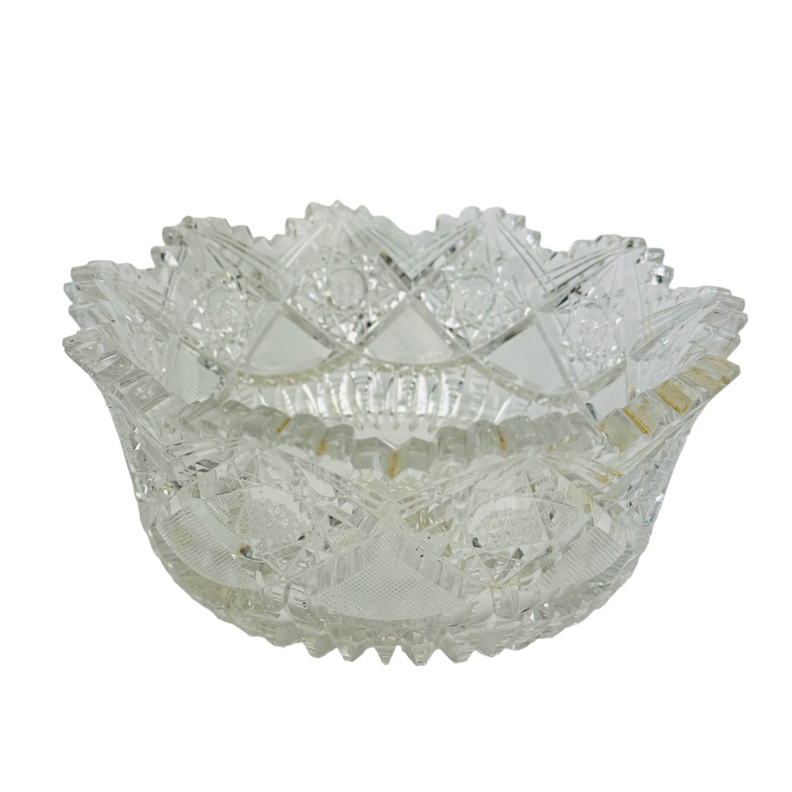 American Brilliant Period Cut Glass Crystal Bowl: Late 19th Early 20th Century ABP Clear Cut Crystal Art Glass Serving Bowl. Graced with deep cut hobstars contained within diamond shapes with intersecting lines. Large central hobstar to the underside