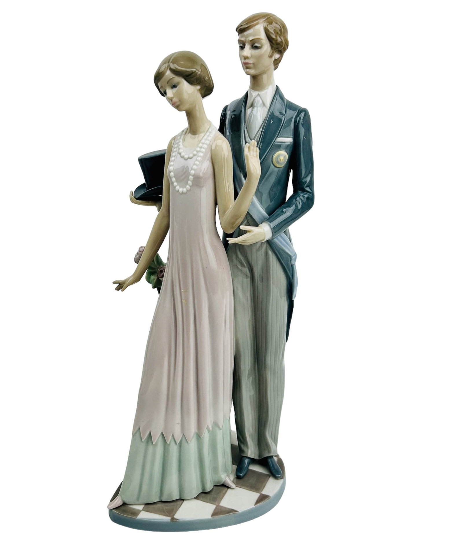 Lladro High Society 1430 Porcelain Couple Figurine: Manufacturer : Lladro, Country of origin : Spain. Name : High Society. Model number : 1430. Production years : 1982 - 1993. Designer : Francisco Catala. Finish : Glazed. Subject matter features an ele