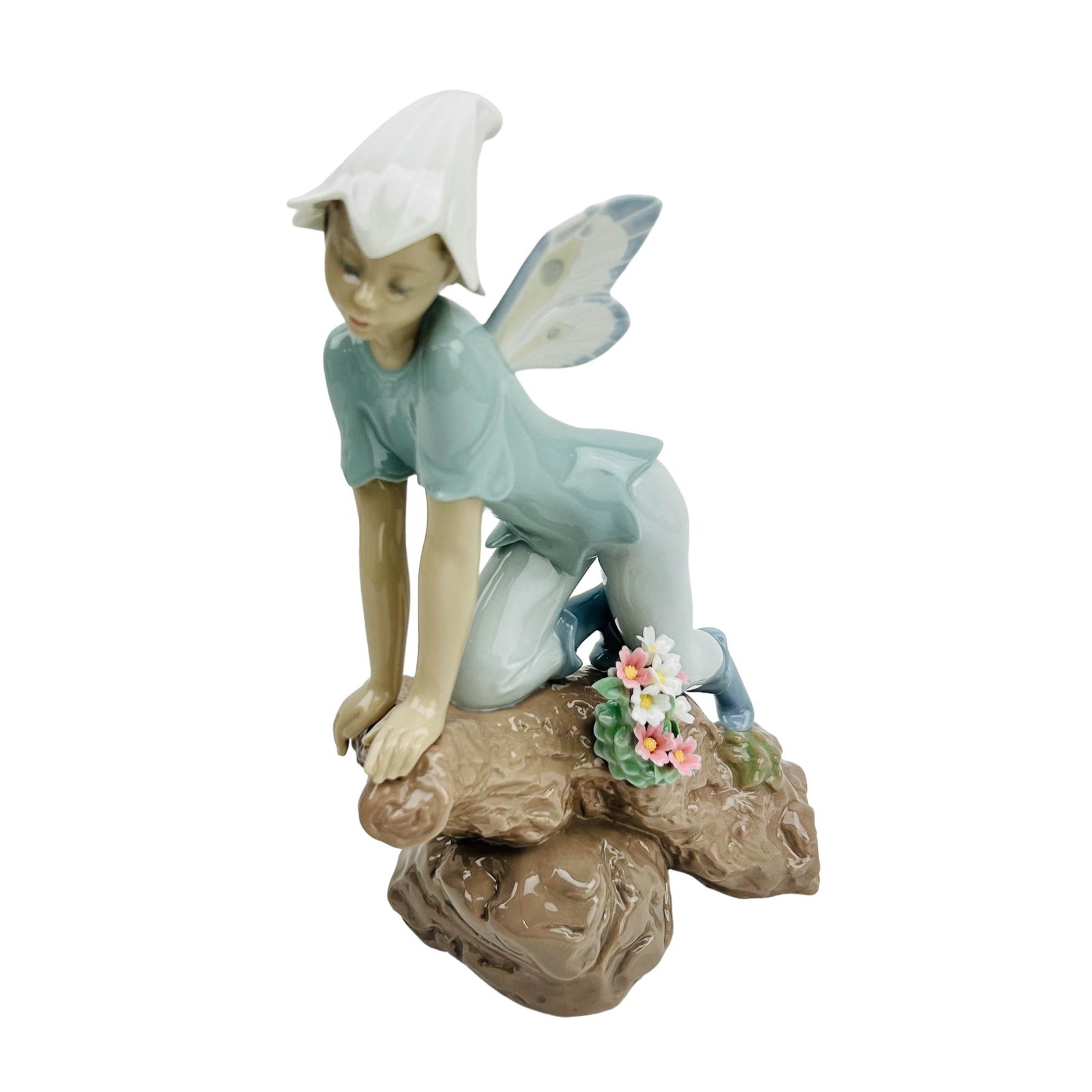 Lladro Prince of the Elves 7690 Porcelain Figurine: Manufacturer : Lladro, Country of origin : Spain. Name : Prince of the Elves. Model number : 7690. Production years : 2001 - 003. Designer : Joan Coderch. Finish : Glazed. Subject matter features this