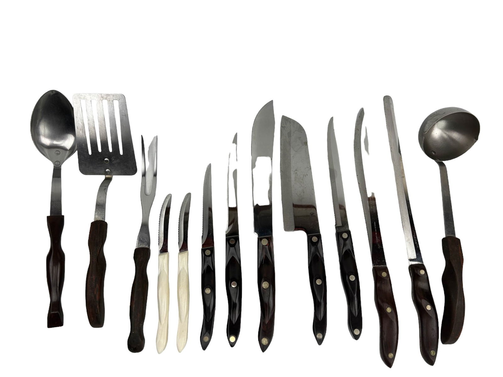 Cutco USA Assorted Cutlery Serving Utensils 13pc: Estate collection lot of a total of thirteen (13) American USA made kitchenware utensils. Includes ~ Basting spoon #1712, Ladle #15, Spatula #16, Carver Knife #1023, Carving Knife #1723, Santoku Knife