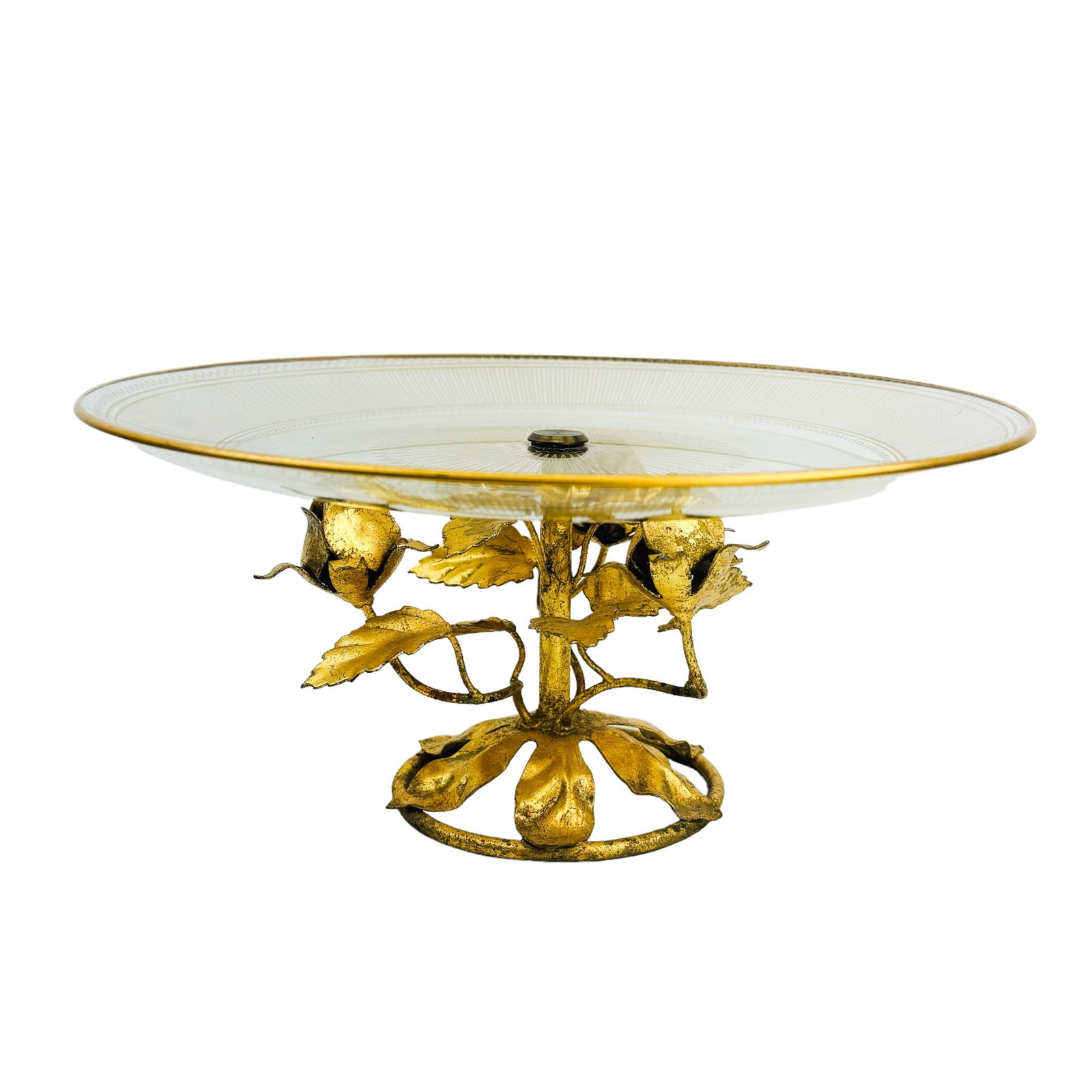 Mid Century Italian Gilt Metal & Glass Centerpiece: handcrafted European origin decorative home interior display. Features a round shallow clear glass bowl with gold tone stenciled vertical rib, saw tooth and a flower pattern design mounted atop a rose
