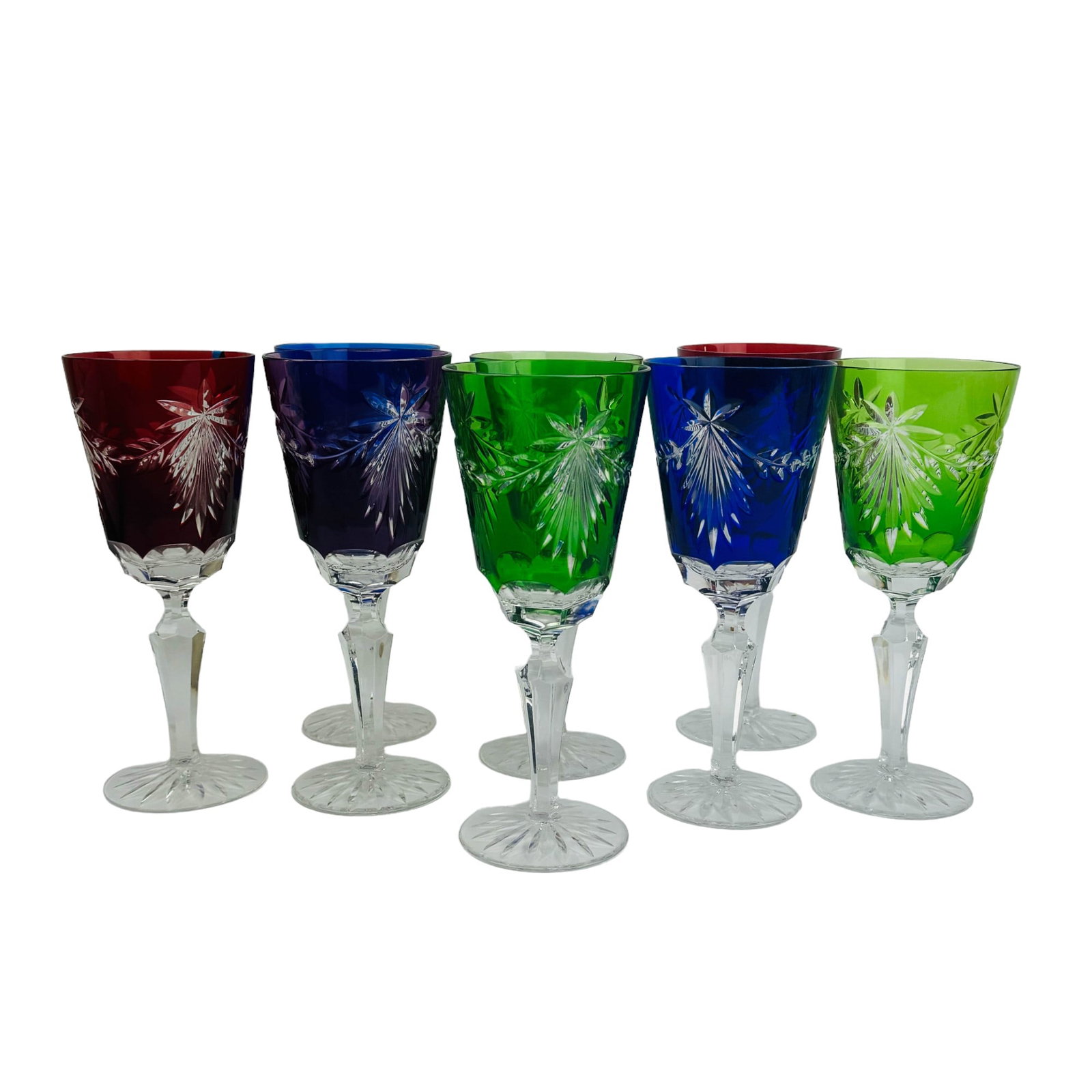 Bohemian Czech Cut to Clear Wine Glass 8 pc Lot: Lot of 8 cut to clear wine glasses. Contains 3 Green, 2 Blue, 2 Red and 1 Lavender. Measures 7 7/8" high, 3 1/4" wide. Condition: Good overall condition with light surface wear and flea bite on 1 rim.