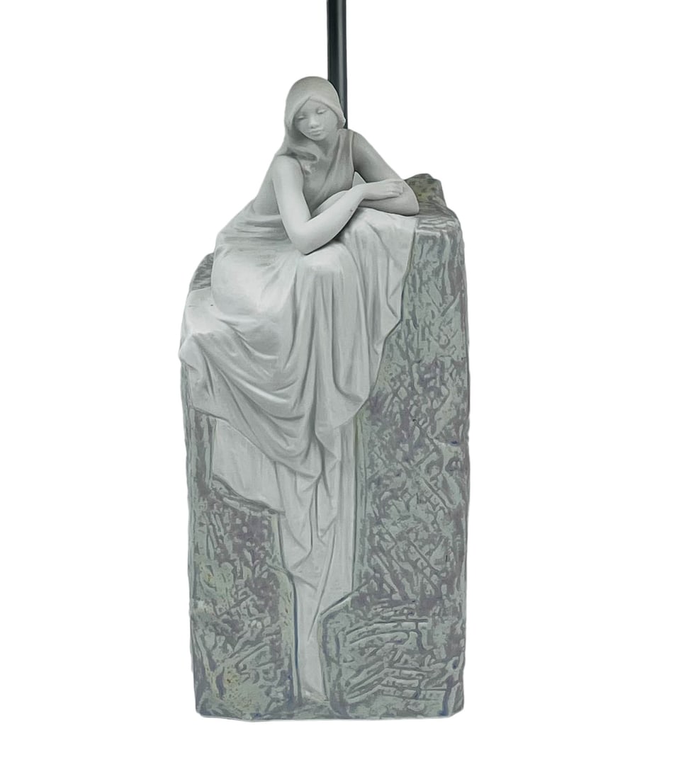 Lladro Spain Meditating Woman #8555 Porcelain Lamp: Manufacturer : Lladro. Country of origin : Spain. Titled : Meditating Woman. Model number : 8555. Circa : 2010. Sculptor : Jose Luis Santes. Finish : Matte and Glazed. Features a slender young lady in