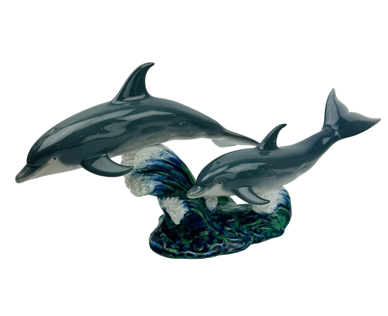 Lladro Dance of Dolphins #6456 Fish Figurine w Box: Manufacturer : Lladro. Country of origin : Spain. Name / Titled : Dance of the Dolphins. Model number : 6456. Sculptor : Francisco Catala. Production years : 1997 - 2002, Features a pair of these inte