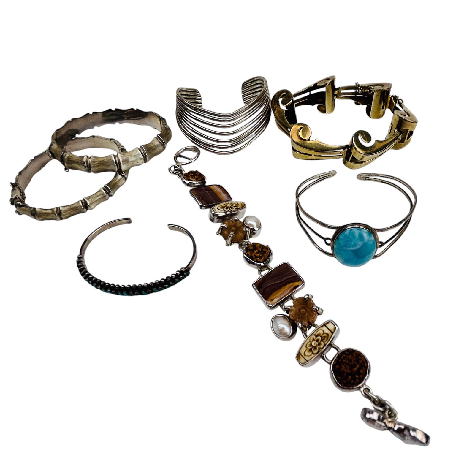 Sterling Silver 925 Gemstone Cuff Link Bracelets: Estate collection lot of a total of seven (7) women's jewelry articles / accessories. Consists of a wide cuff with multiple parallel bands, a set of two matching bamboo-style bangles, a bracelet with