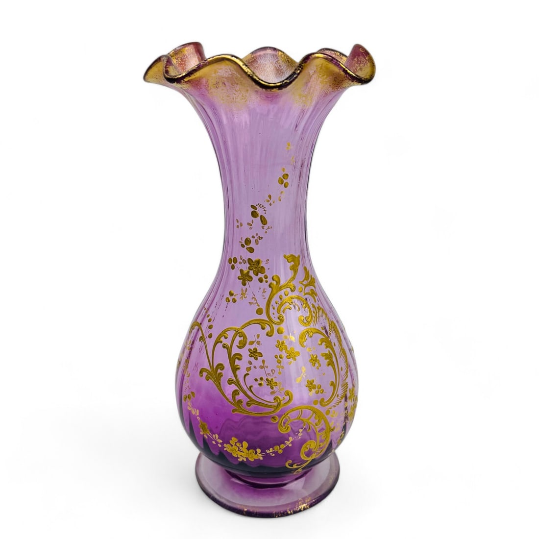 Ribbed Pink Ruffle Vase Gold Gilt Floral Motif: Beautifully ruffled rim and intricately applied gold gilt decoration in a scrolling floral motif. The vase has a ribbed, elongated body that enhances its graceful form, sitting on a sturdy base. Gold 