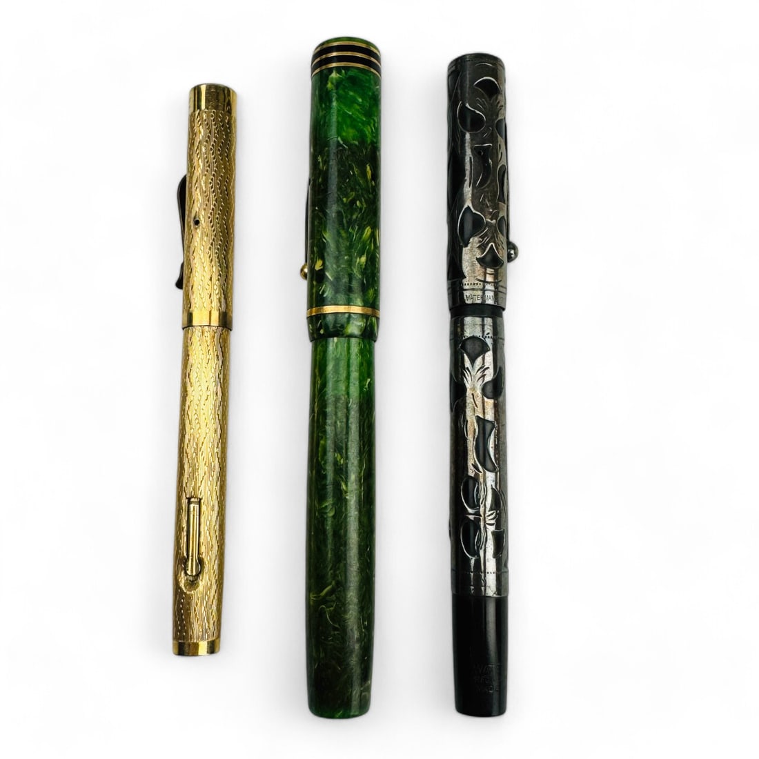 Lot 3 Vintage Fountain Pens Waterman Wahl Chilton: Lot of 3 vintage fountain pens. the Waterman features a sterling silver overlay and a 14k nib. The Wahl is gold-filled with a 14k gold nib. The Chilton comes in a striking green. Measure 4 7/8" - 5 1/