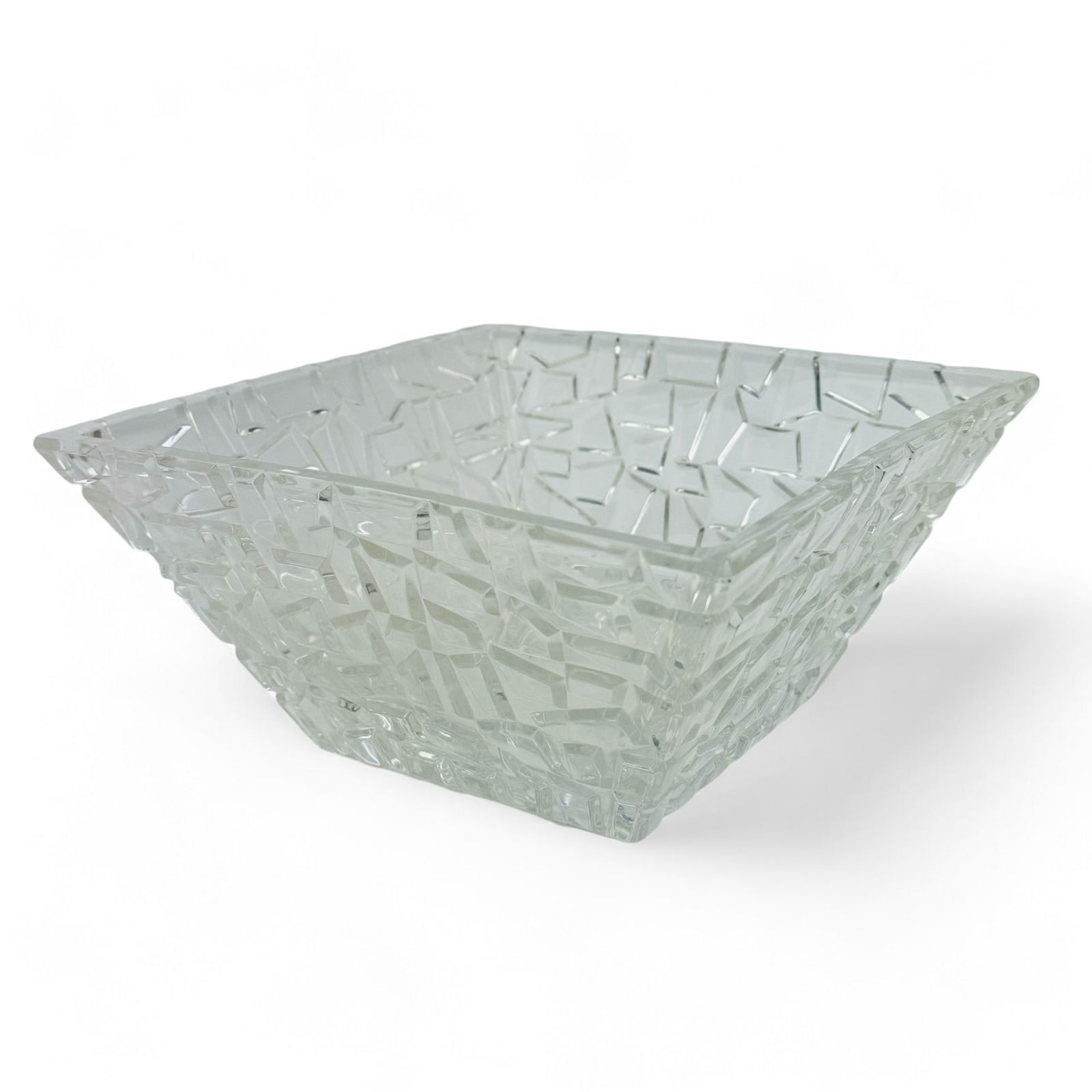 Tiffany Co Crystal Art Glass Sierra Serving Bowl: Early 21st century clear crystal glass bowl modeled by Tiffany in their Sierra pattern between 2011 - 2018. Graced with a geometric inspired raised textured pattern on the outside. Interior and the un